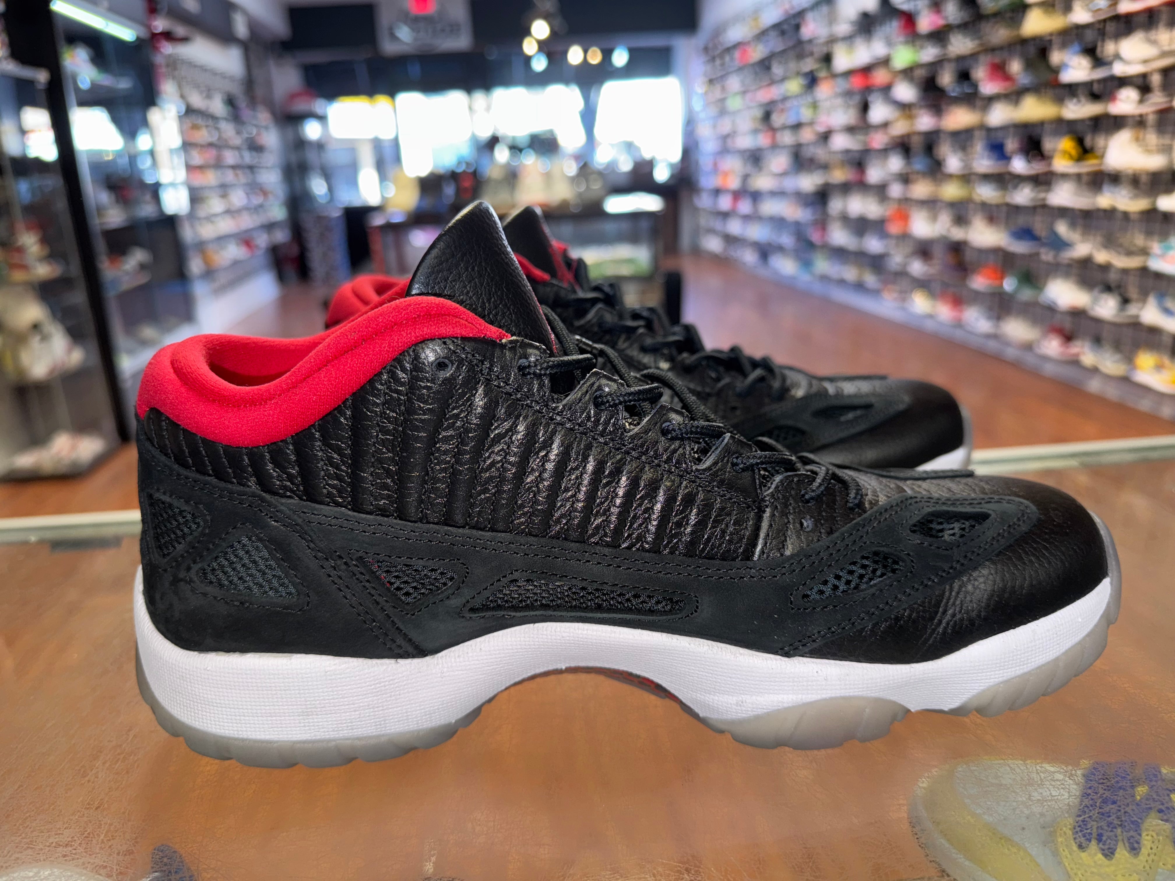 Size 11 Air Jordan 11 Low IE “Black Cement”