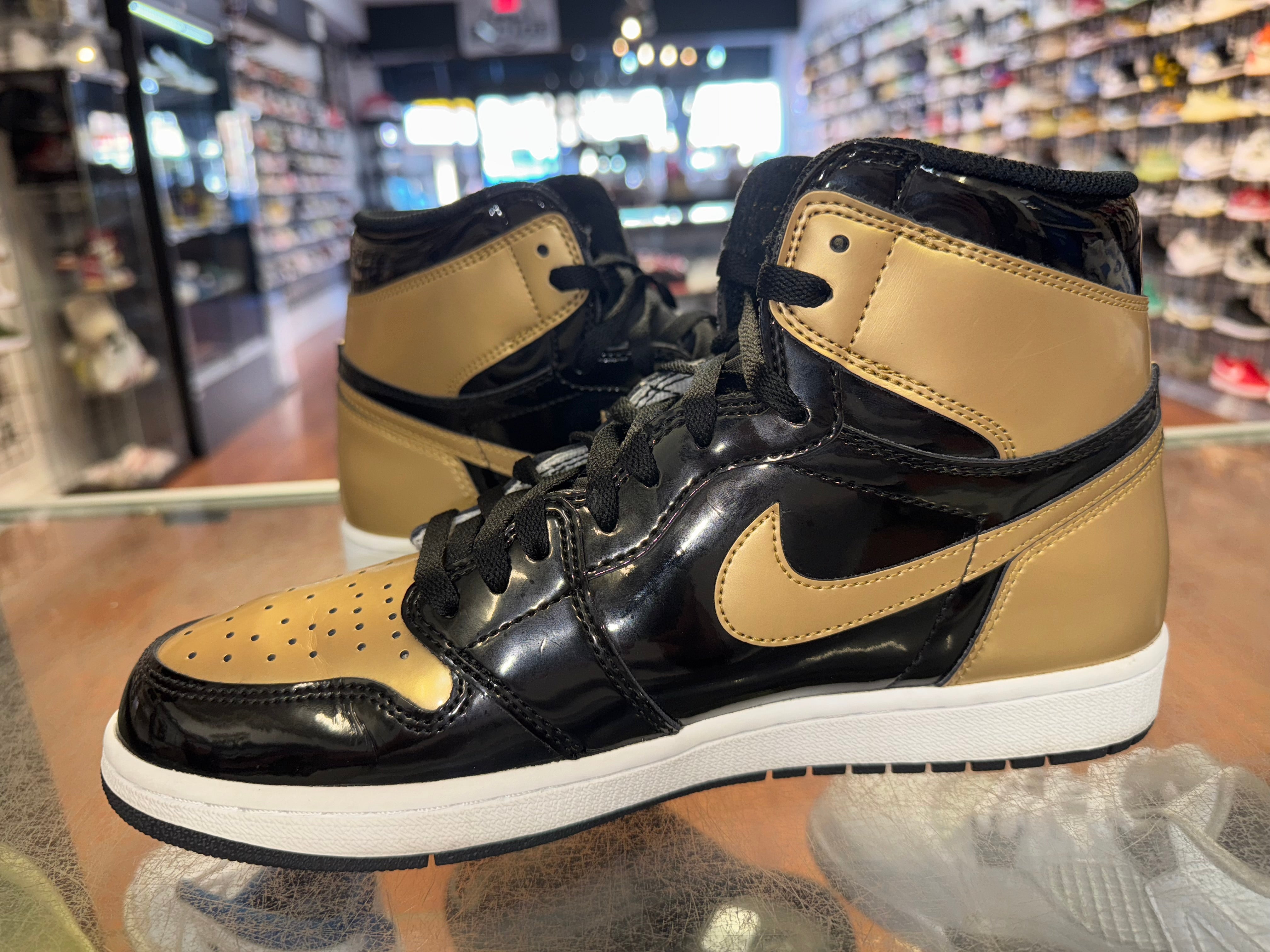 Size 10 Air Jordan 1 "Gold Toe"