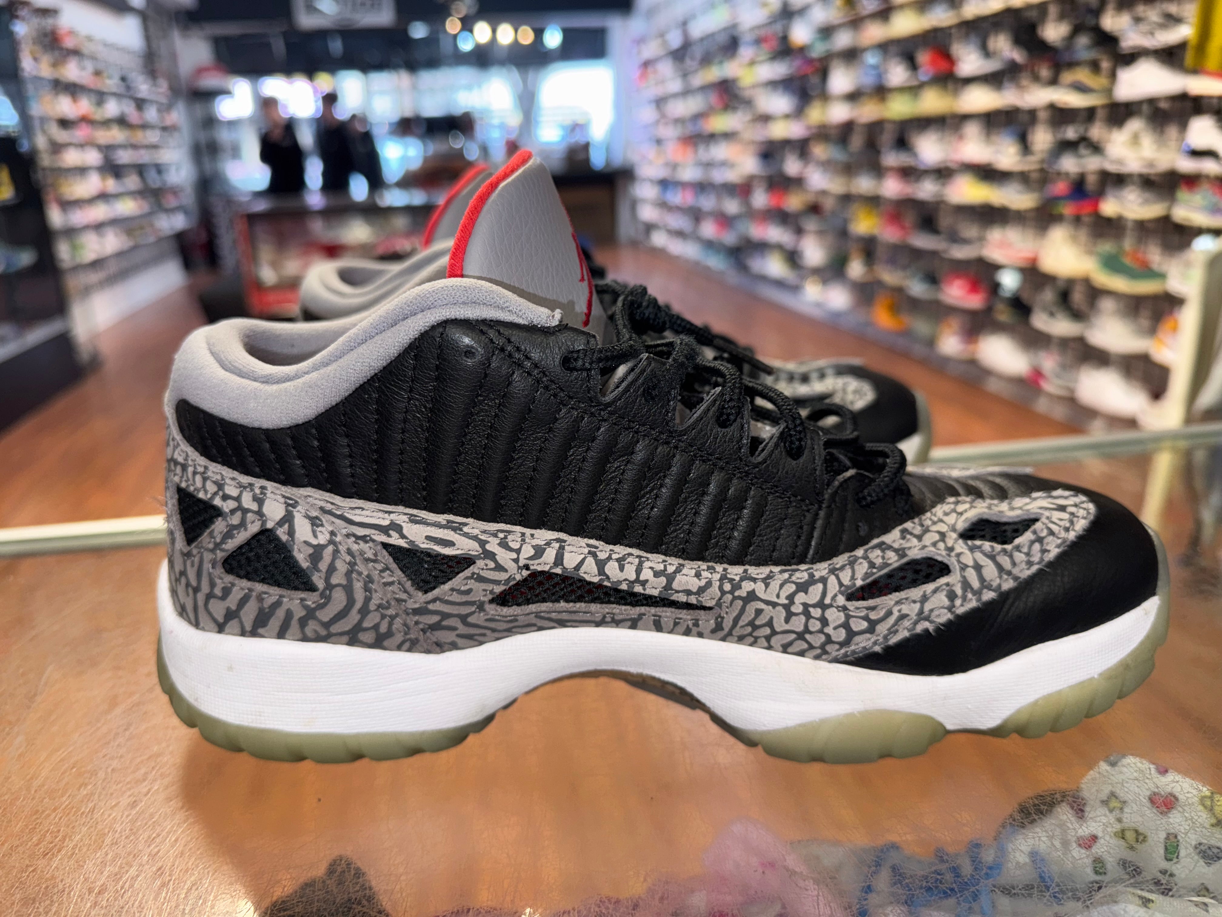 Size 10 Air Jordan 11 Low IE "Black Cement"