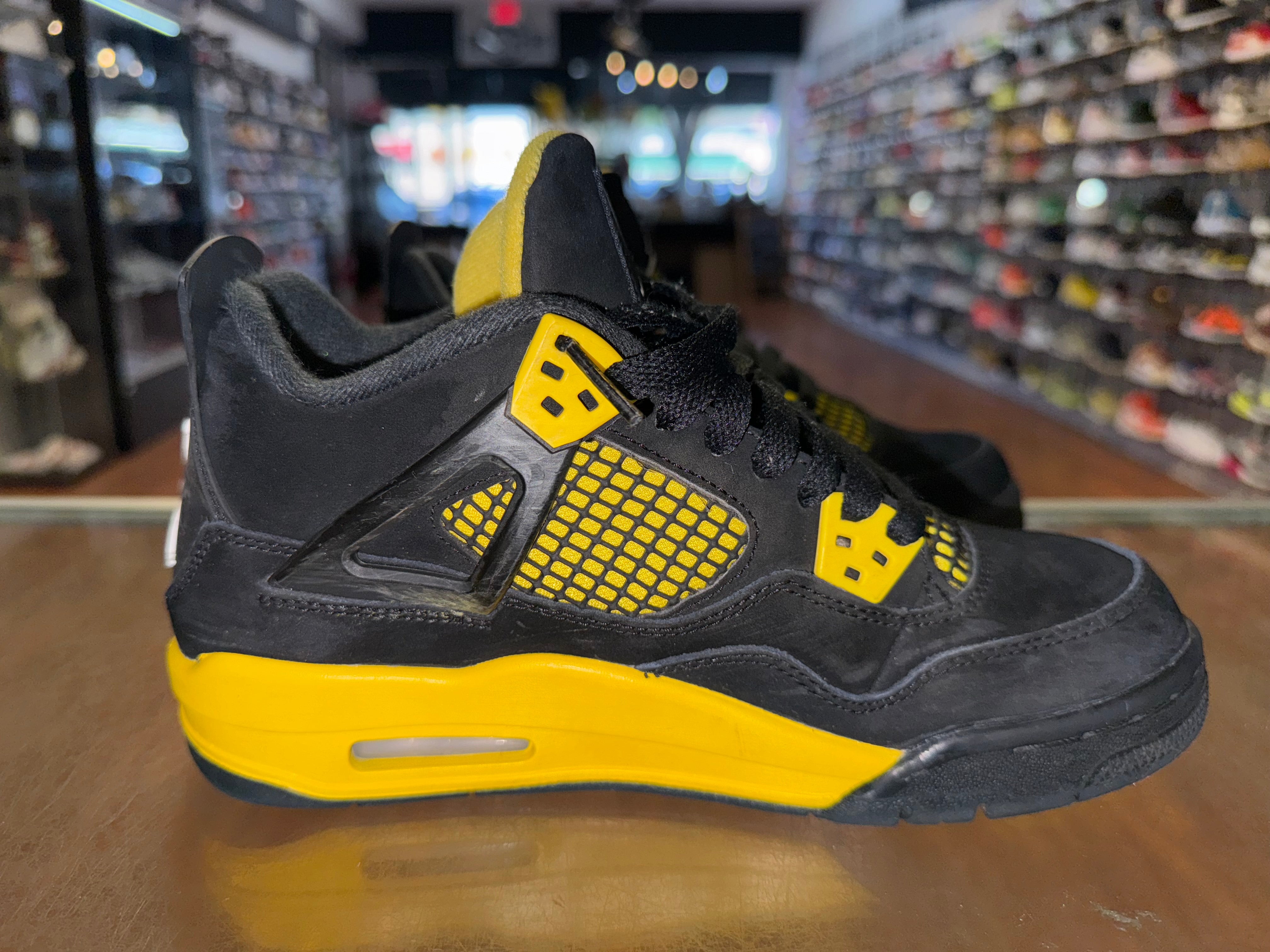 Size 6y Air Jordan 4 “Thunder”