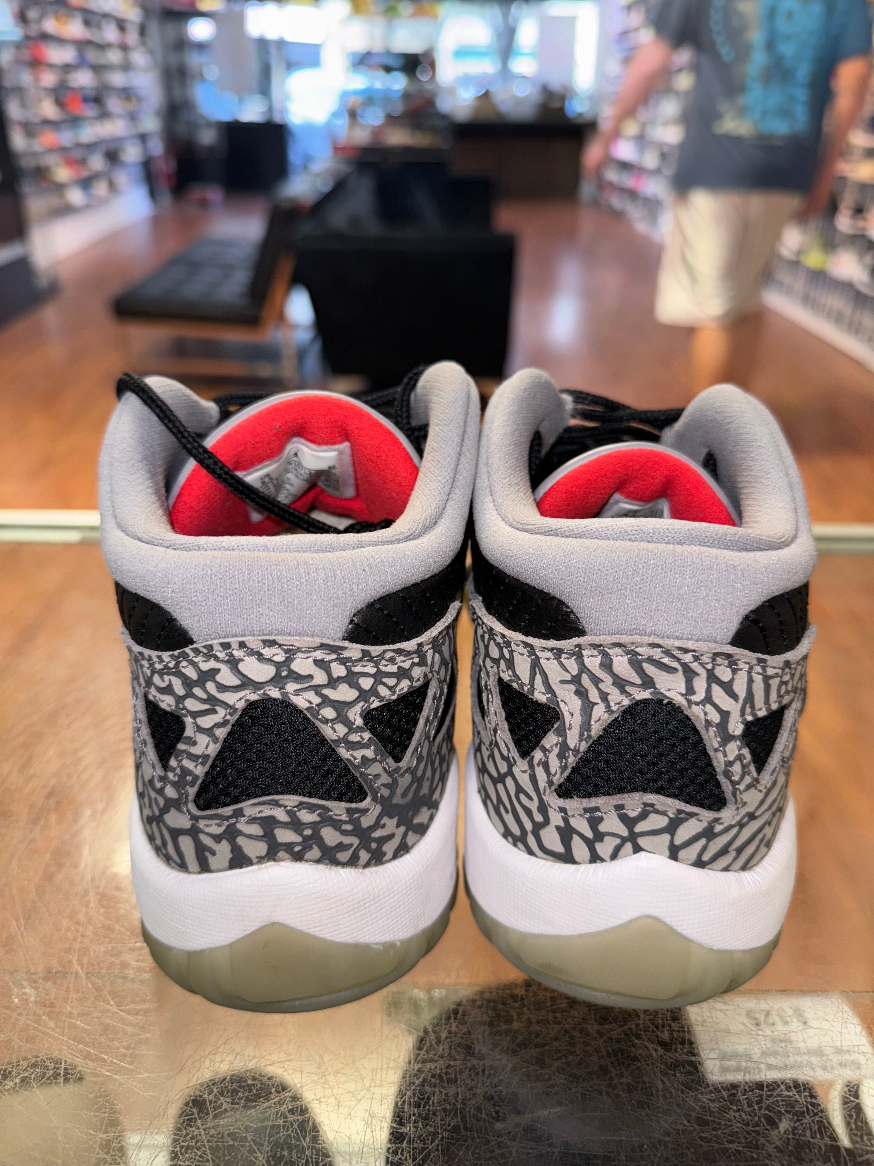 Size 8.5 Air Jordan 11 Low IE “Black Cement”