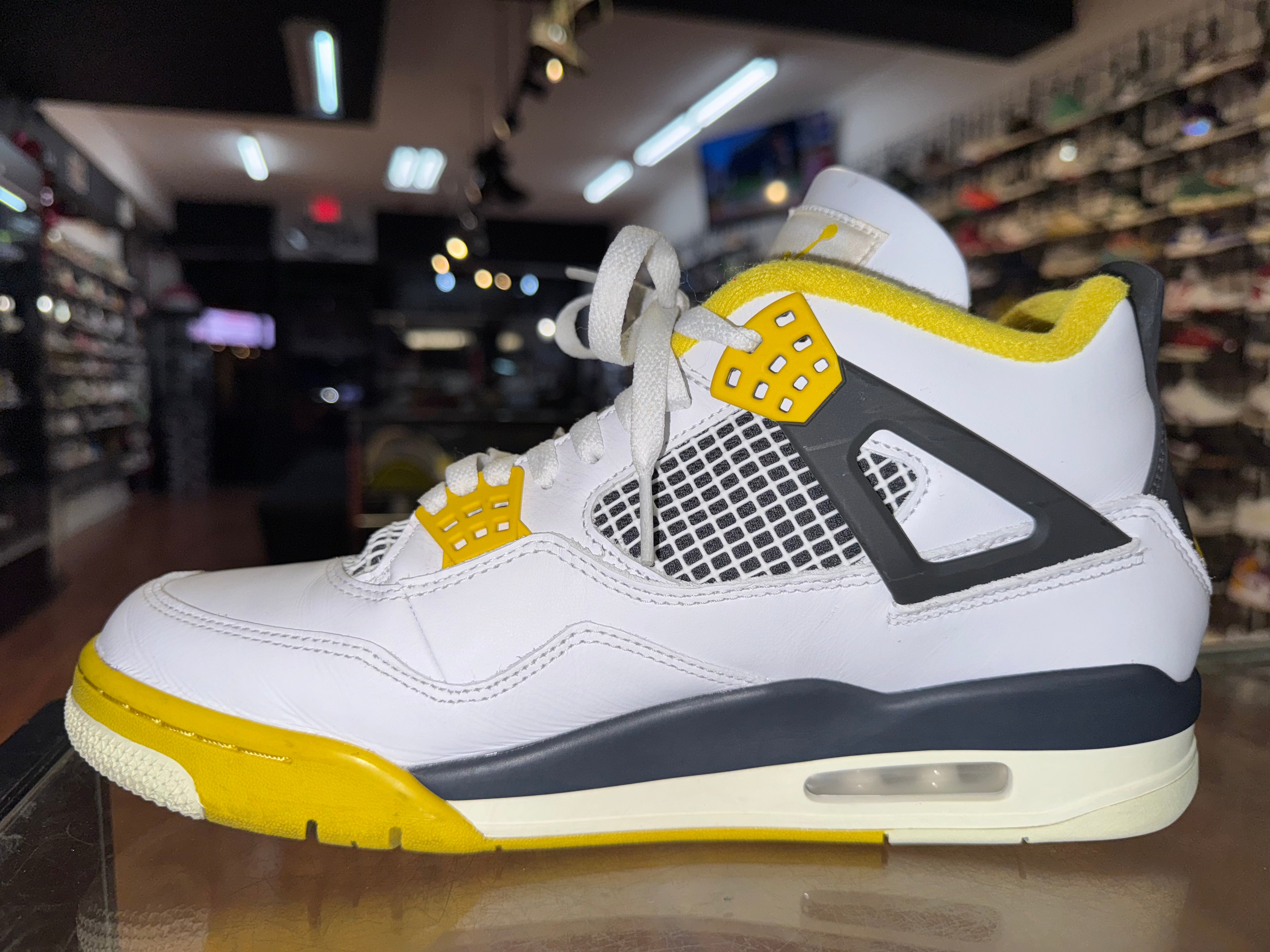 Size 10.5 (12W) Air Jordan 4 "Vivid Sulfur"