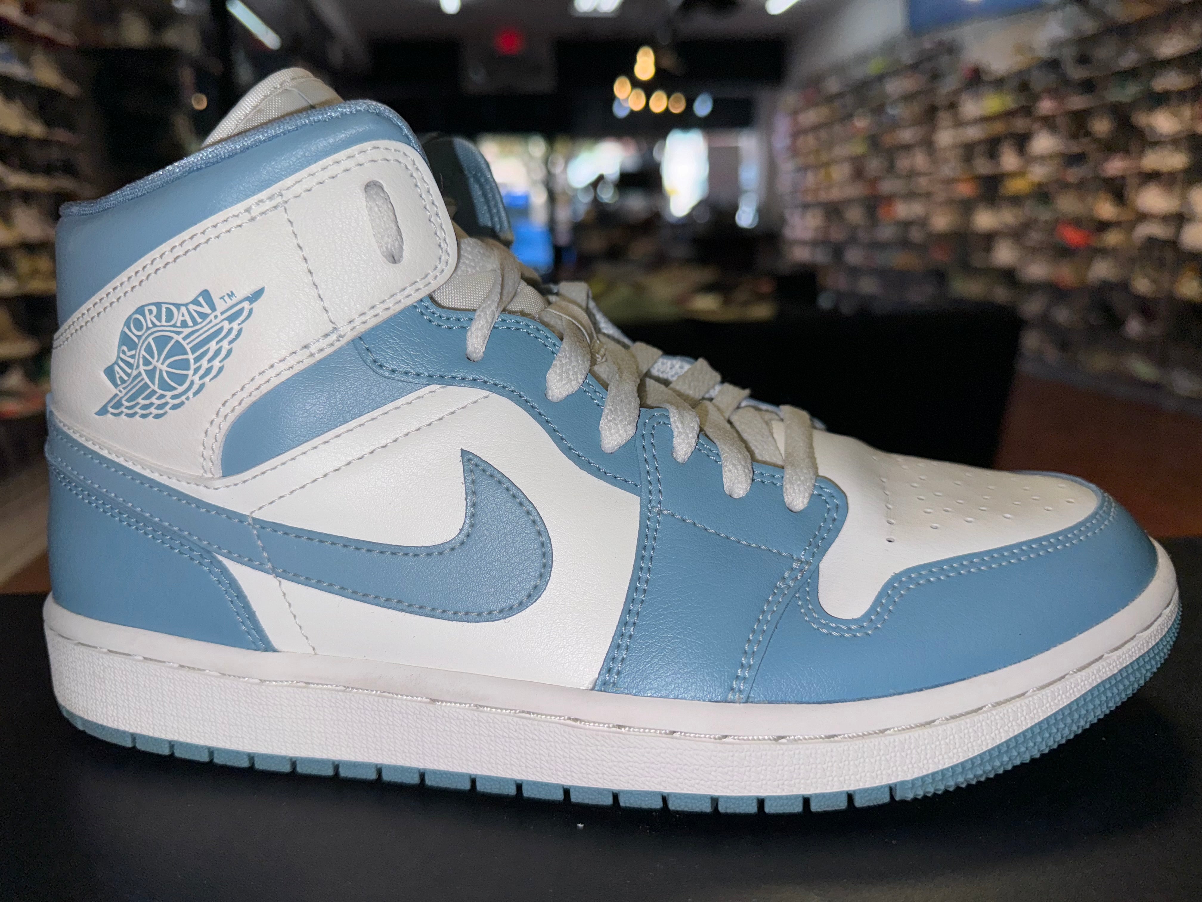 Size 9.5 (11W) Air Jordan 1 Mid “UNC”