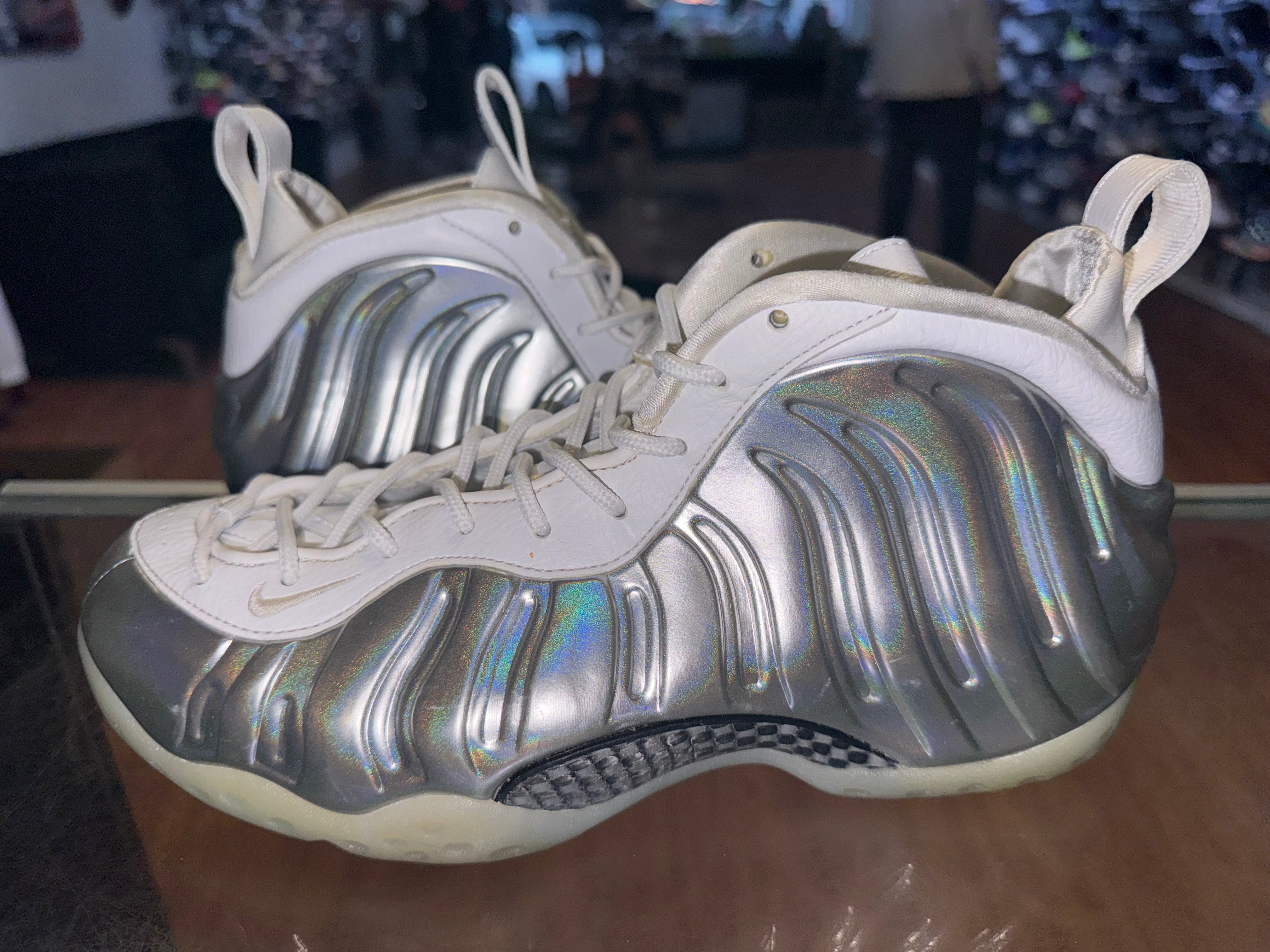 Size 7.5 (9W) Air Foamposite One “Metallic Silver”