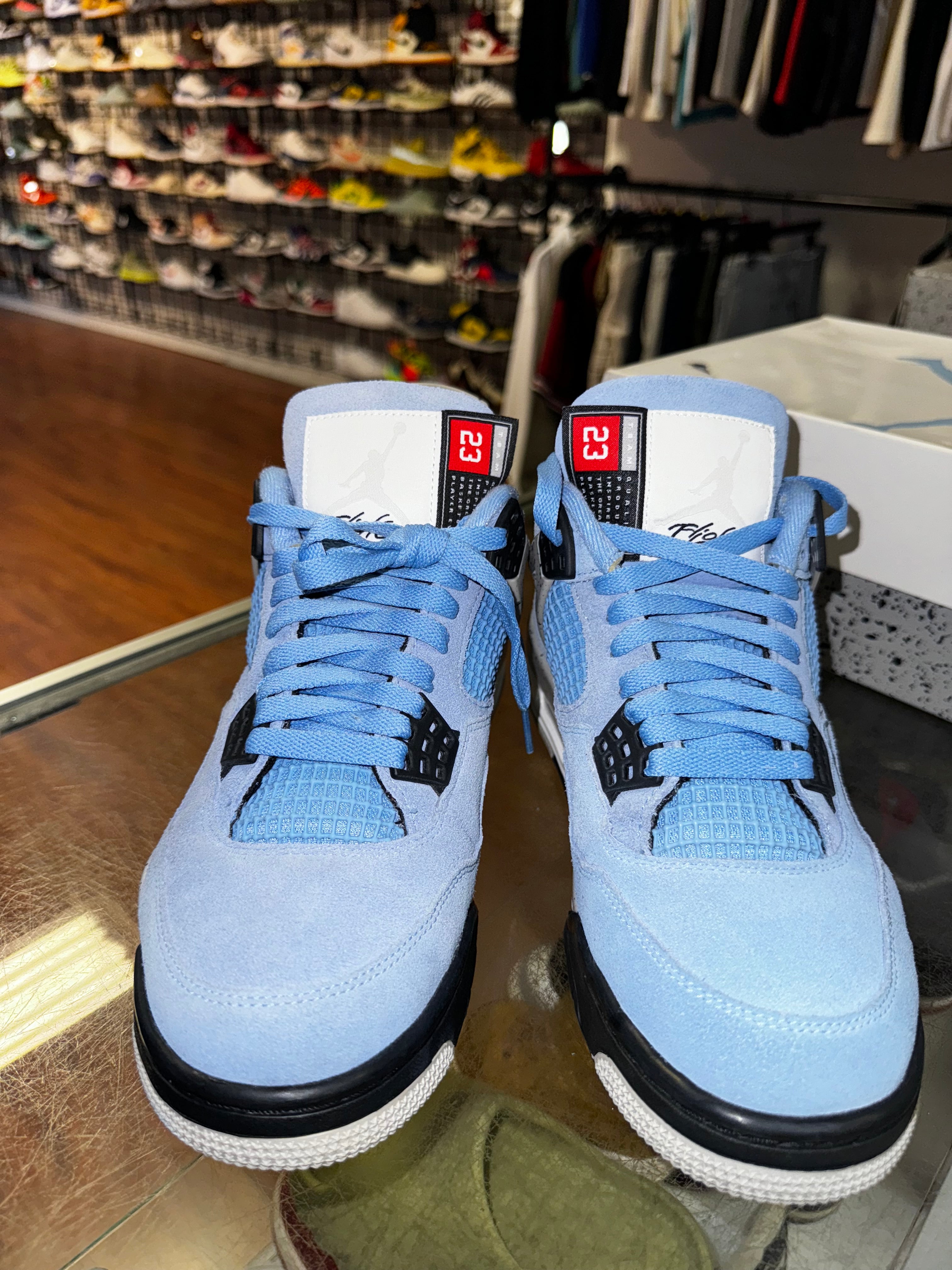 Size 9 Air Jordan 4 "UNC"