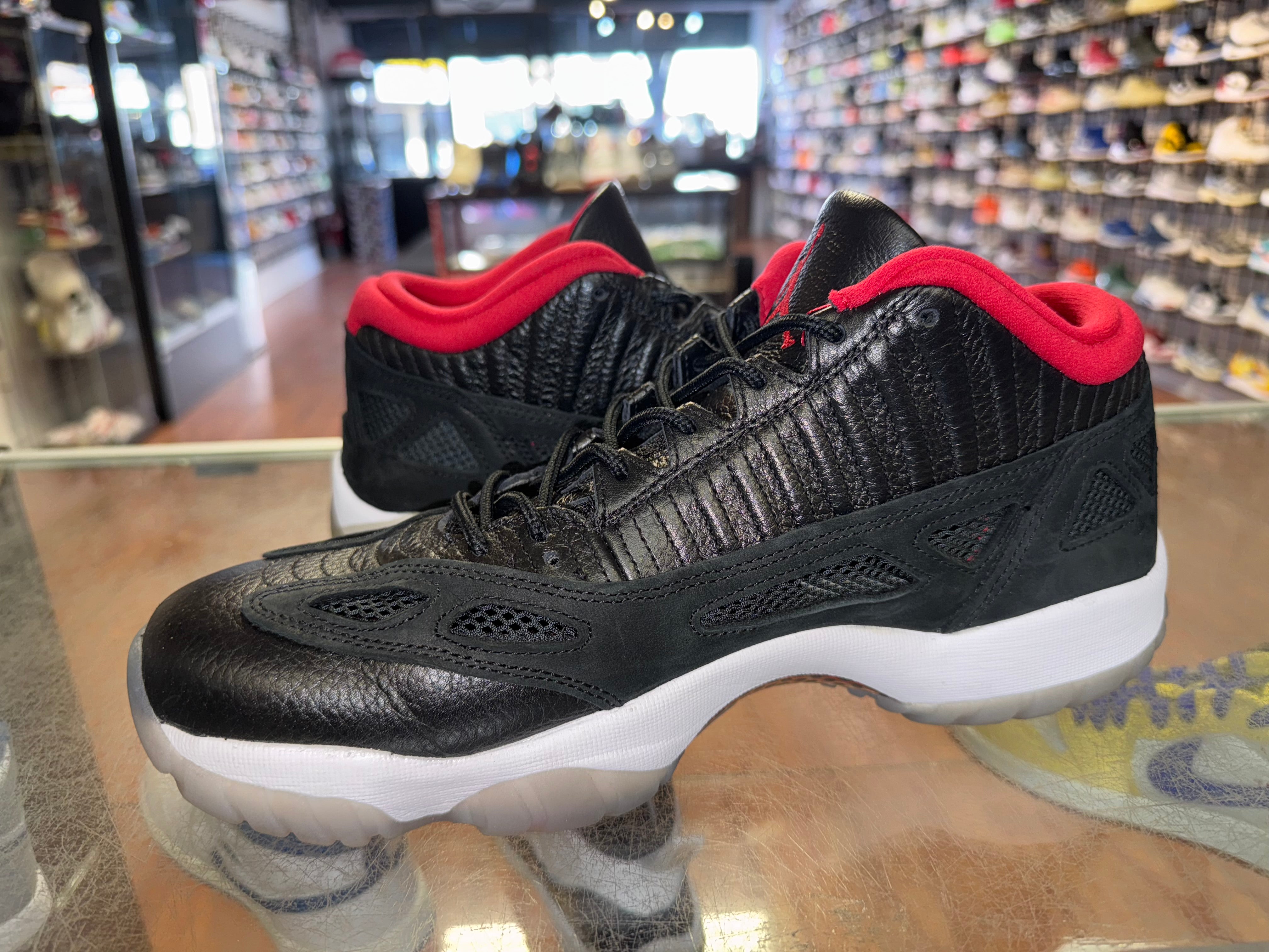 Size 11 Air Jordan 11 Low IE “Black Cement”