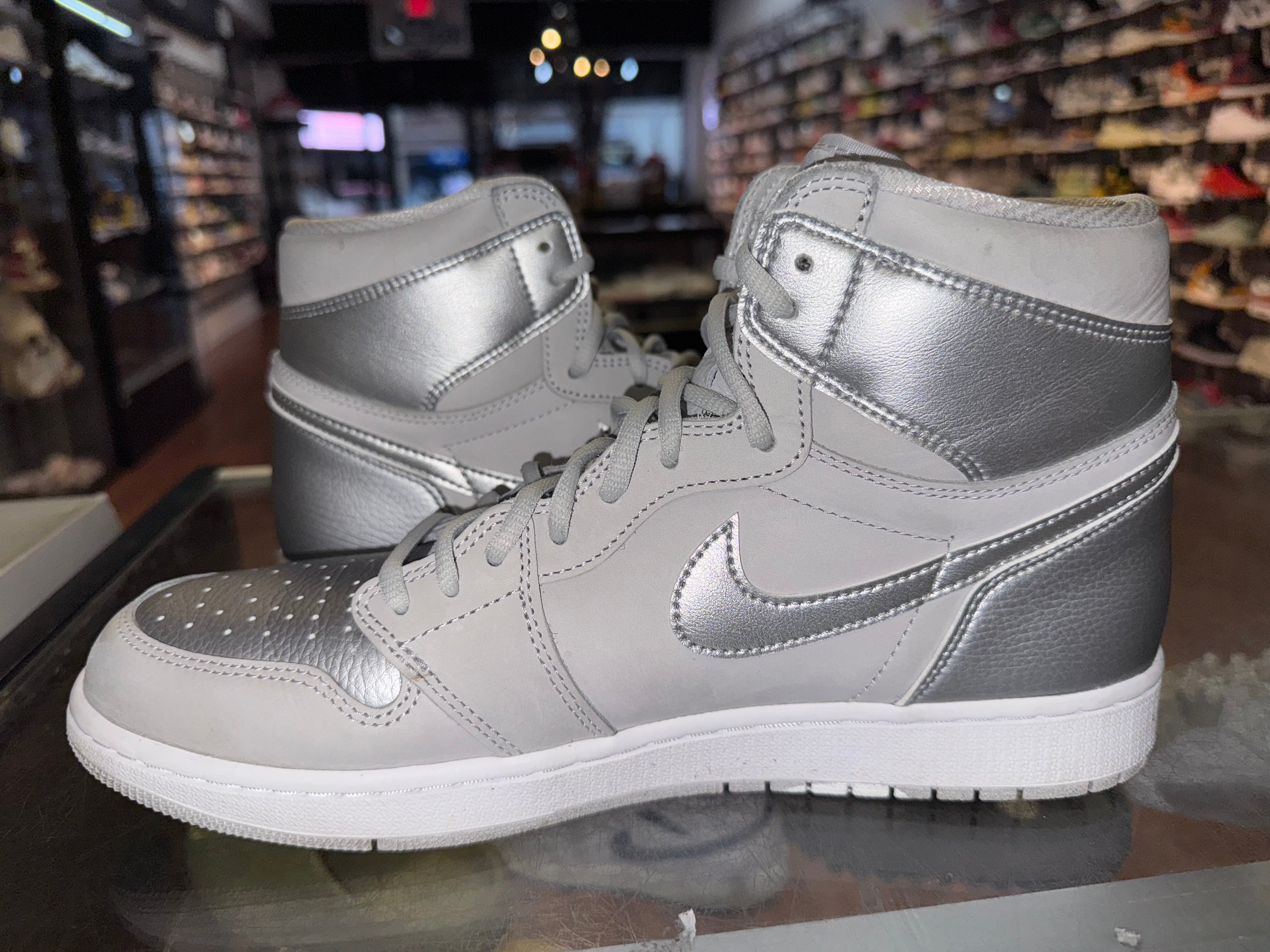 Size 12 Air Jordan 1 COJP “Silver”