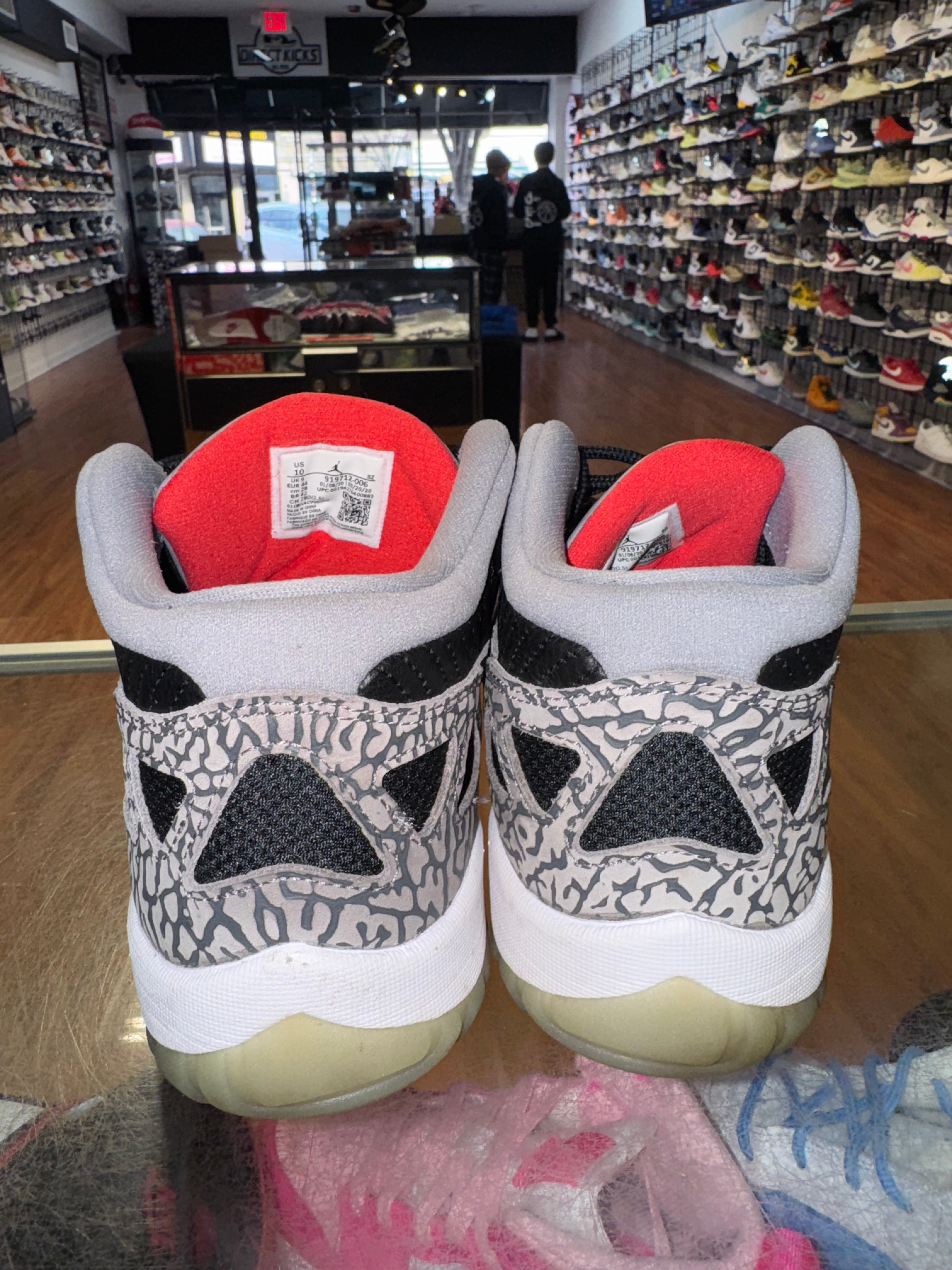 Size 10 Air Jordan 11 Low IE "Black Cement"