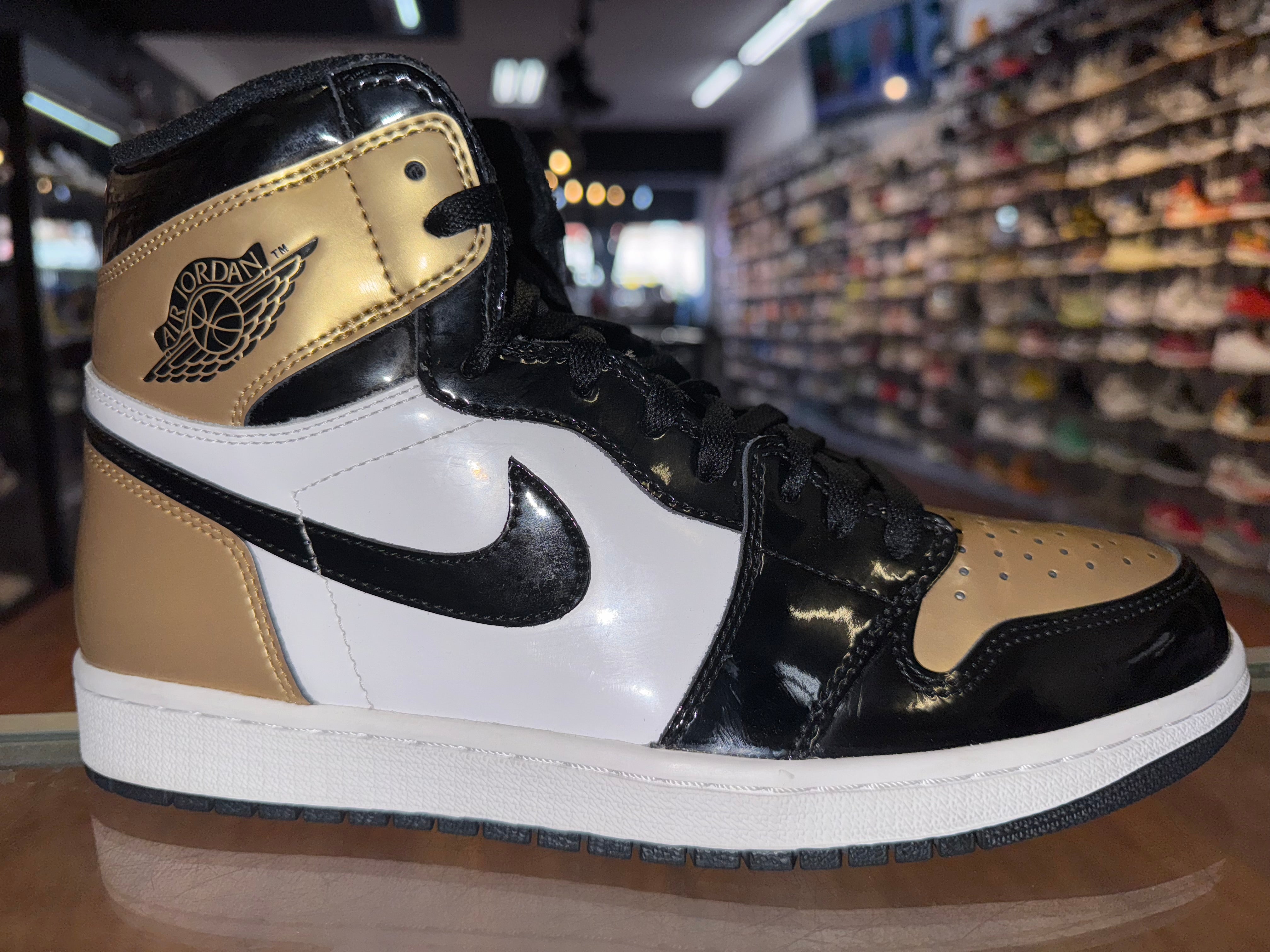 Size 10 Air Jordan 1 "Gold Toe"