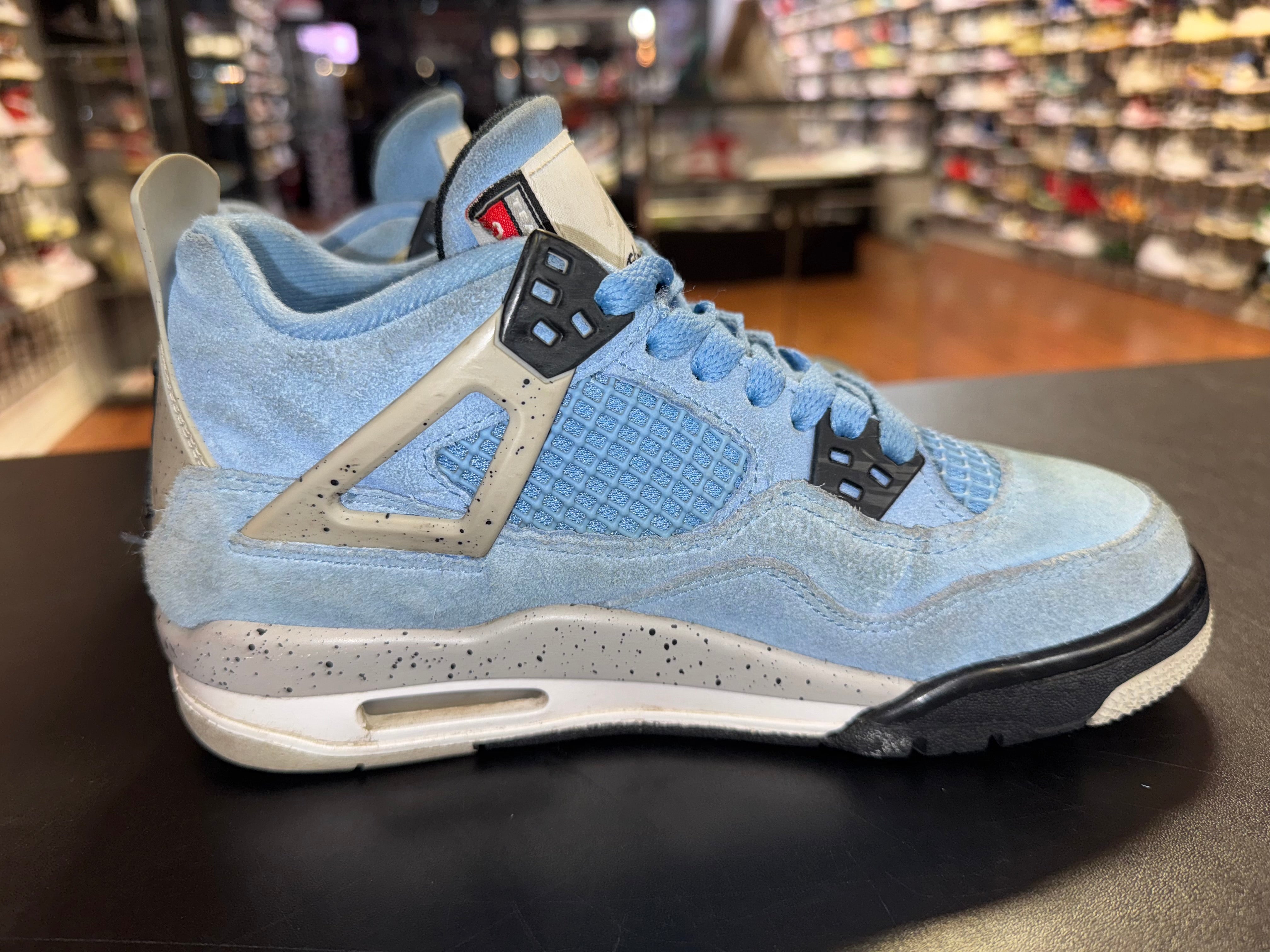 Size 4.5y Air Jordan 4 “University Blue”