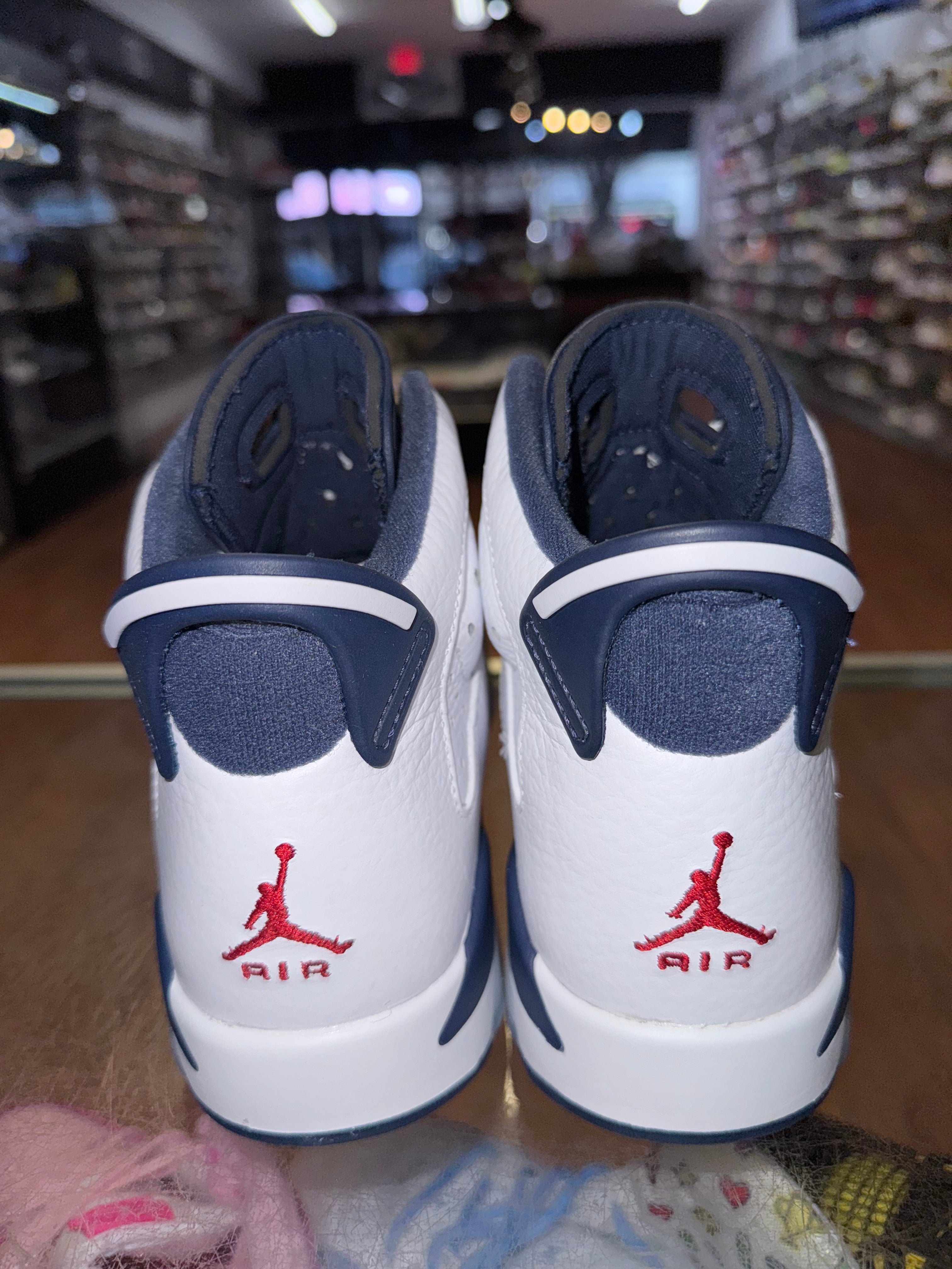 Size 7y Air Jordan 6 "Olympic"