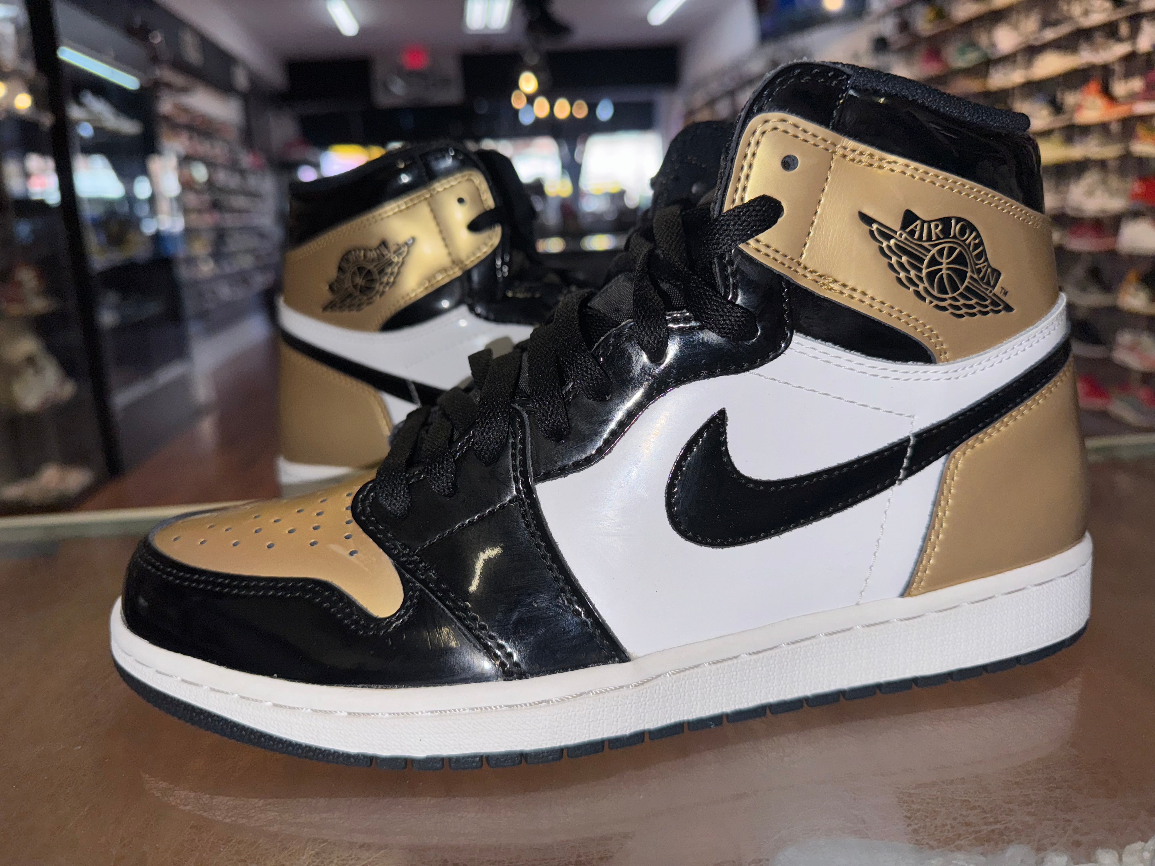 Size 10 Air Jordan 1 "Gold Toe"