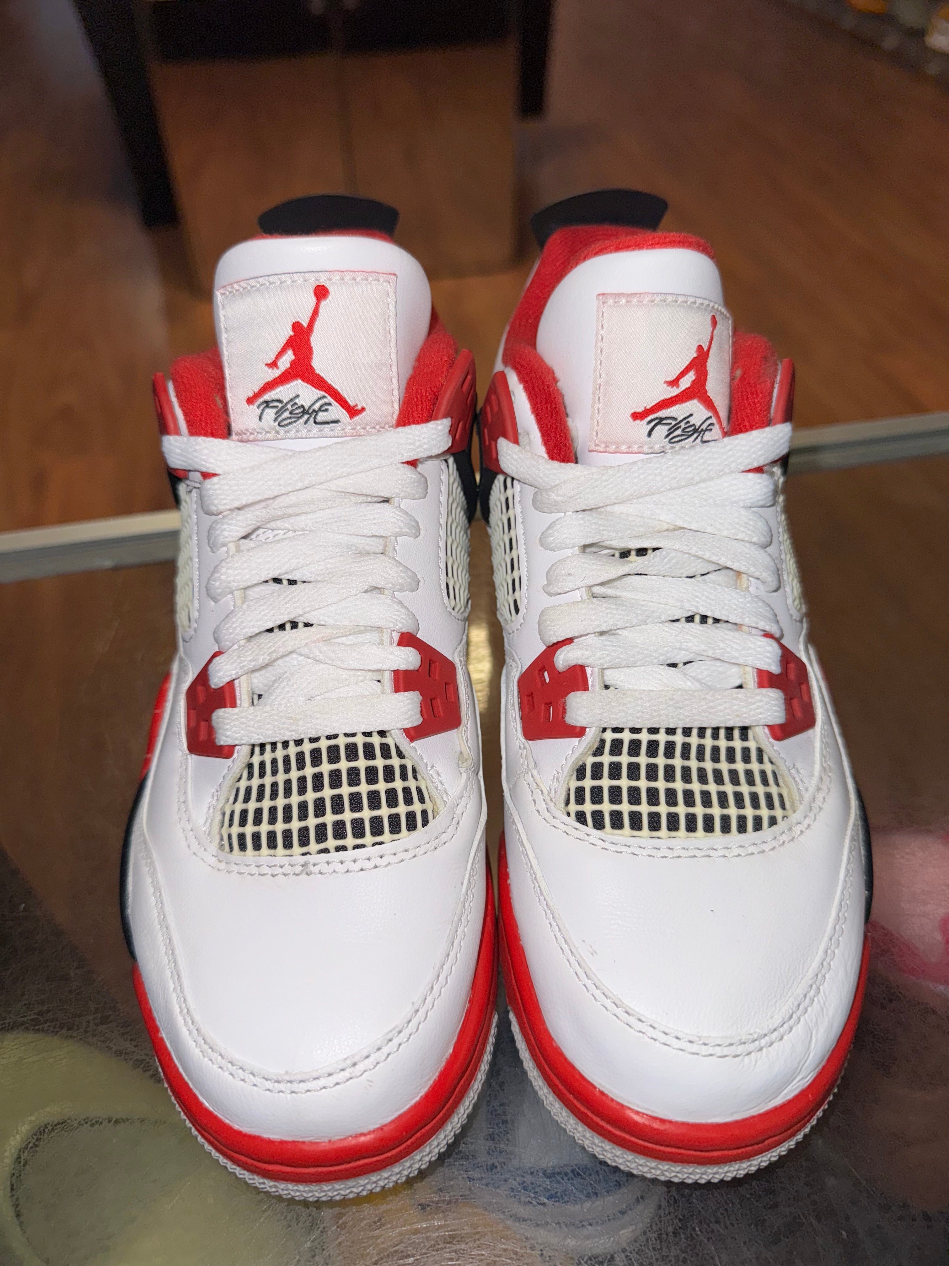 Size 4y Air Jordan 4 “Fire Red”