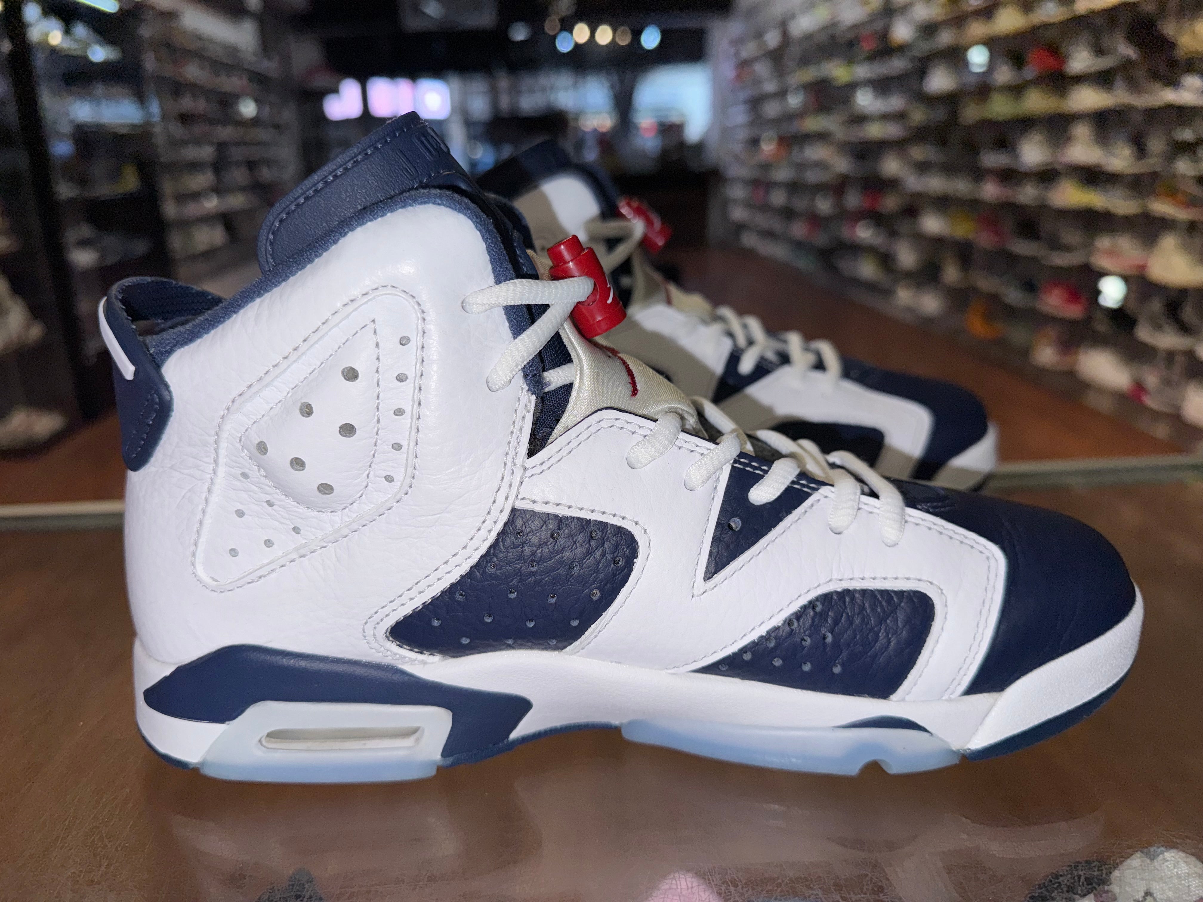 Size 7y Air Jordan 6 "Olympic"