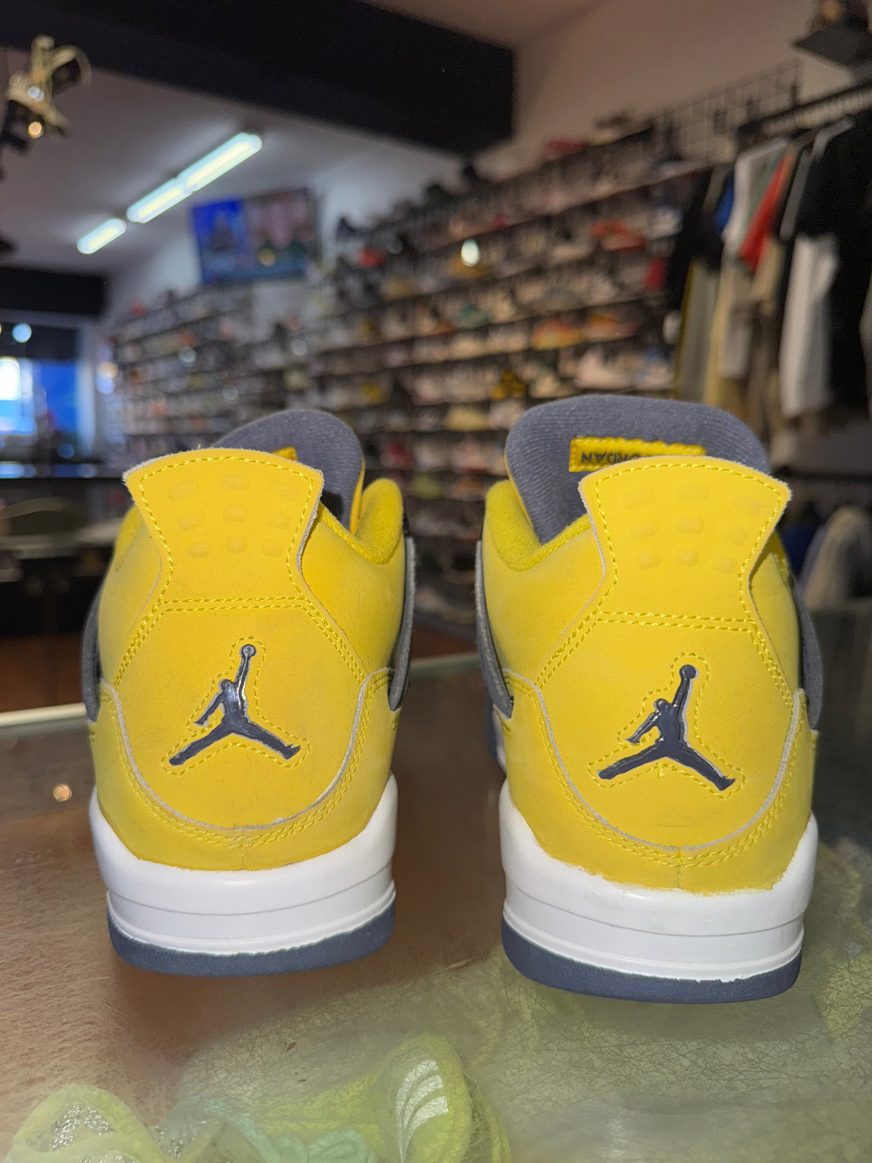 Size 7y Air Jordan 4 "Lightning"