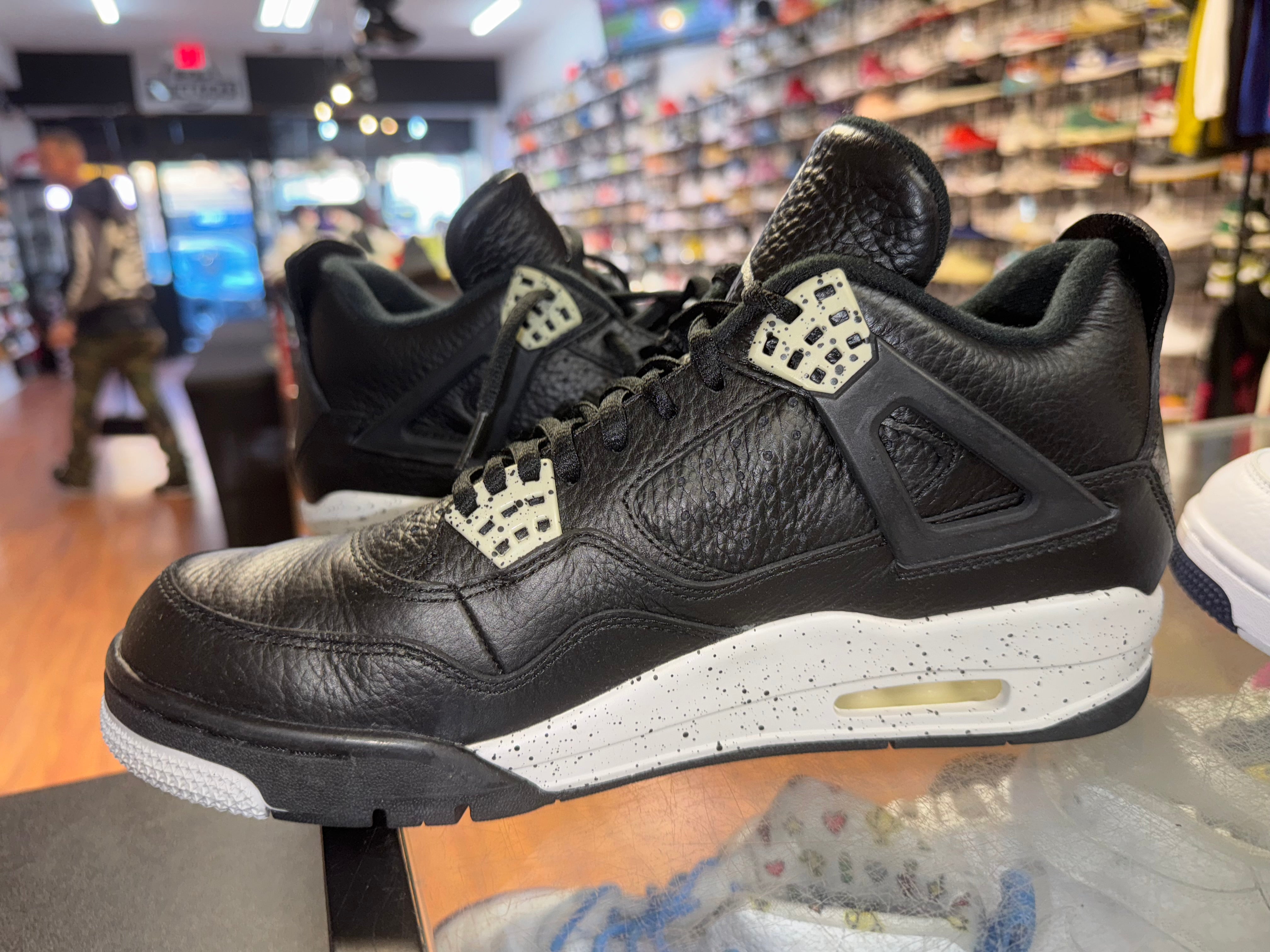 Size 9.5 Air Jordan 4 “Black Oreo”