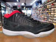 Size 11 Air Jordan 11 Low IE “Black Cement”