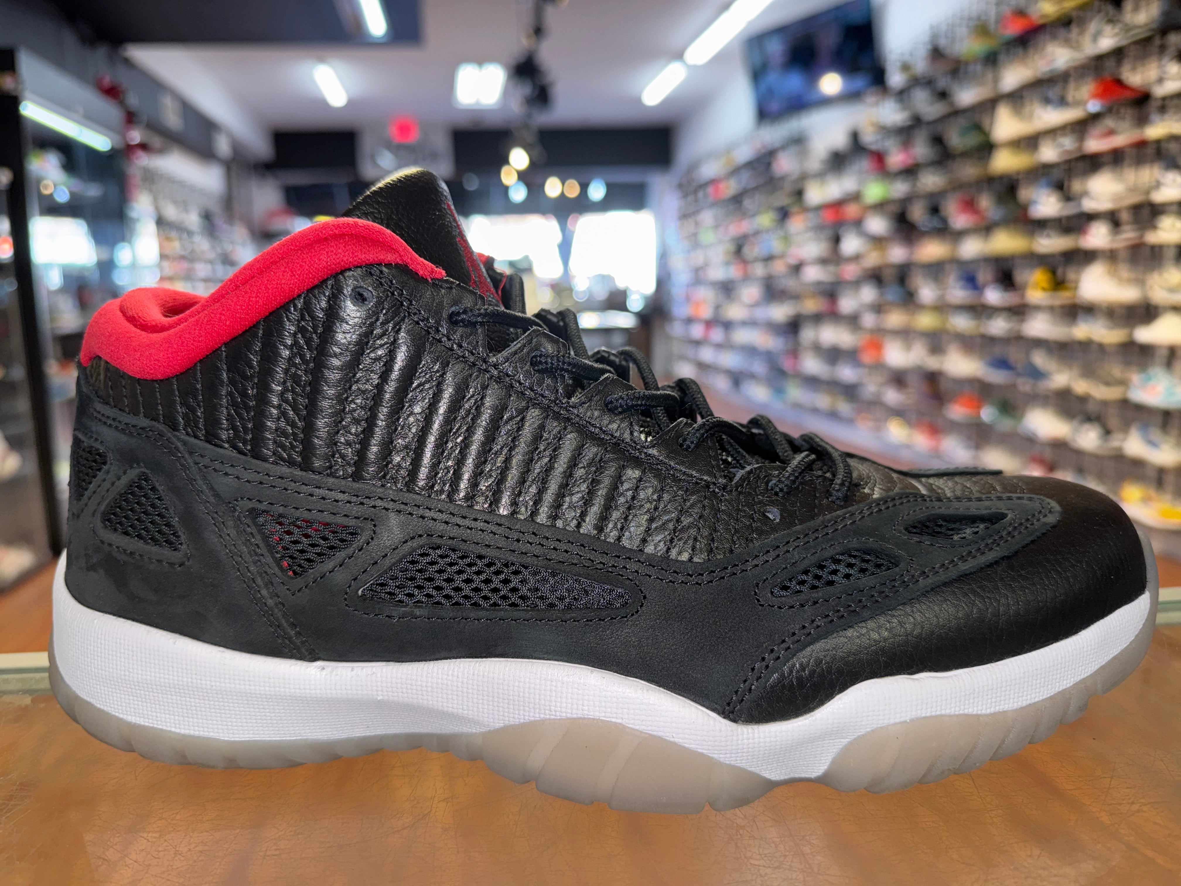 Size 11 Air Jordan 11 Low IE “Black Cement”