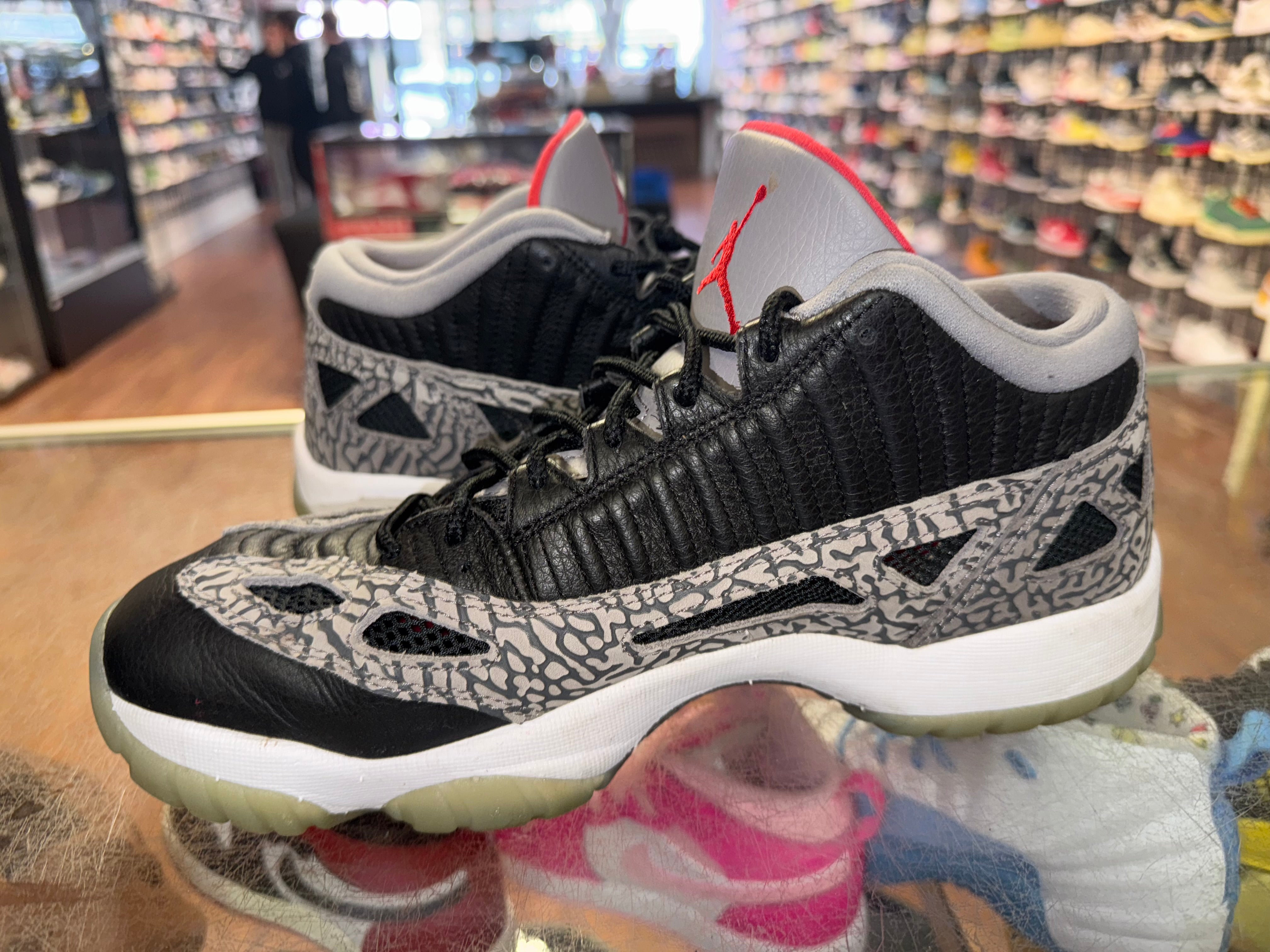 Size 10 Air Jordan 11 Low IE "Black Cement"