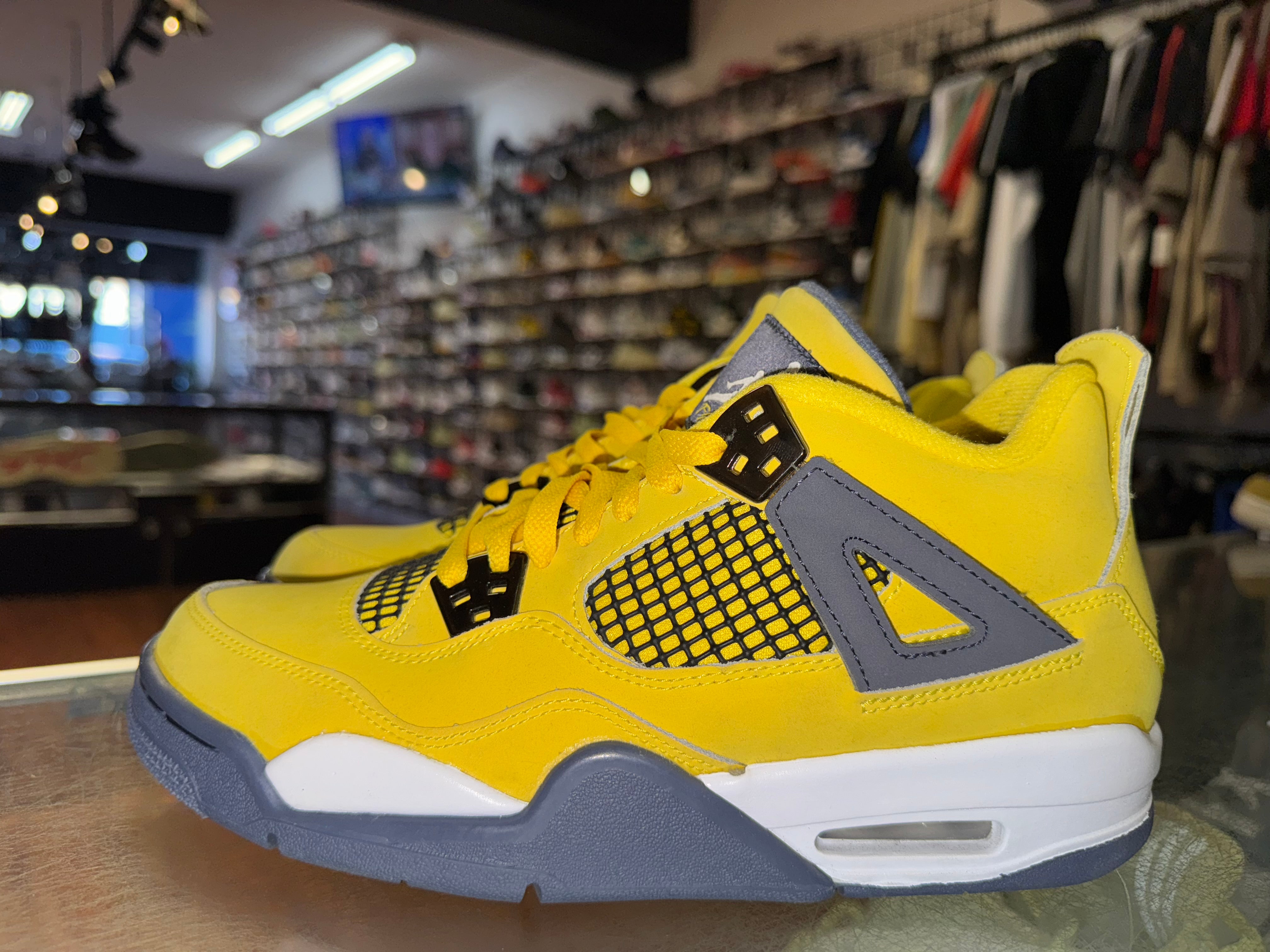 Size 7y Air Jordan 4 "Lightning"