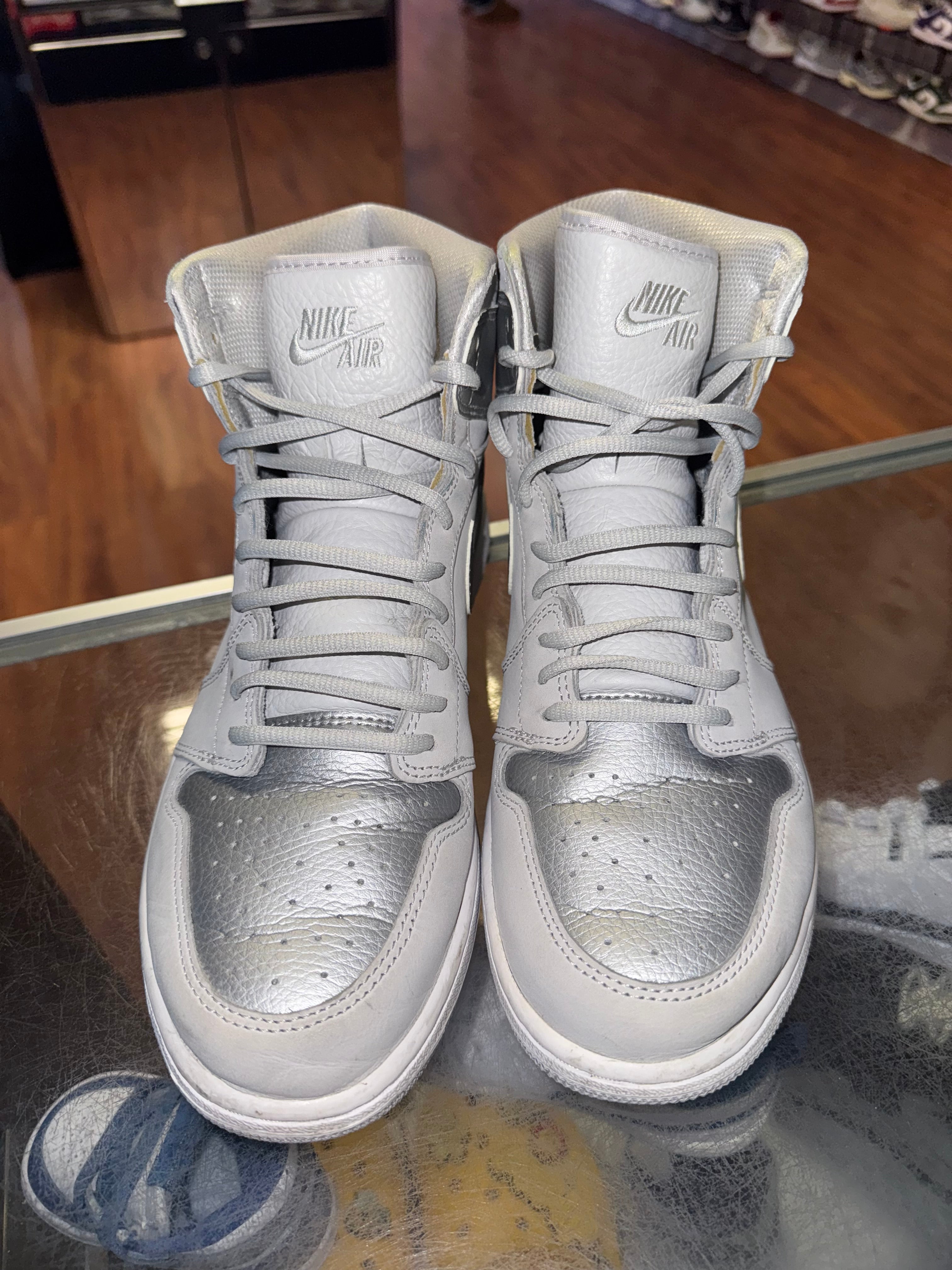 Size 11.5 Air Jordan 1 “COJP Silver”