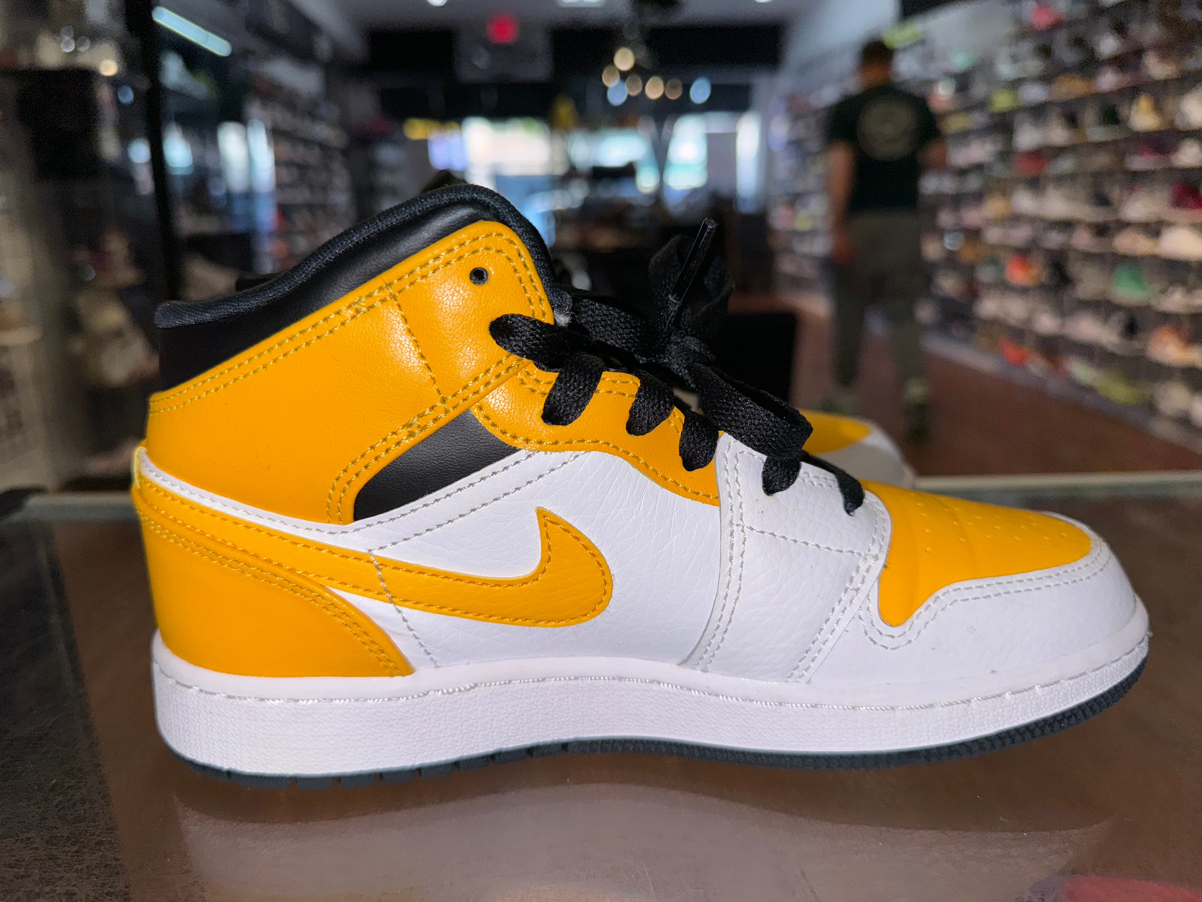 Size 4y Air Jordan 1 Mid “Yellow Toe”