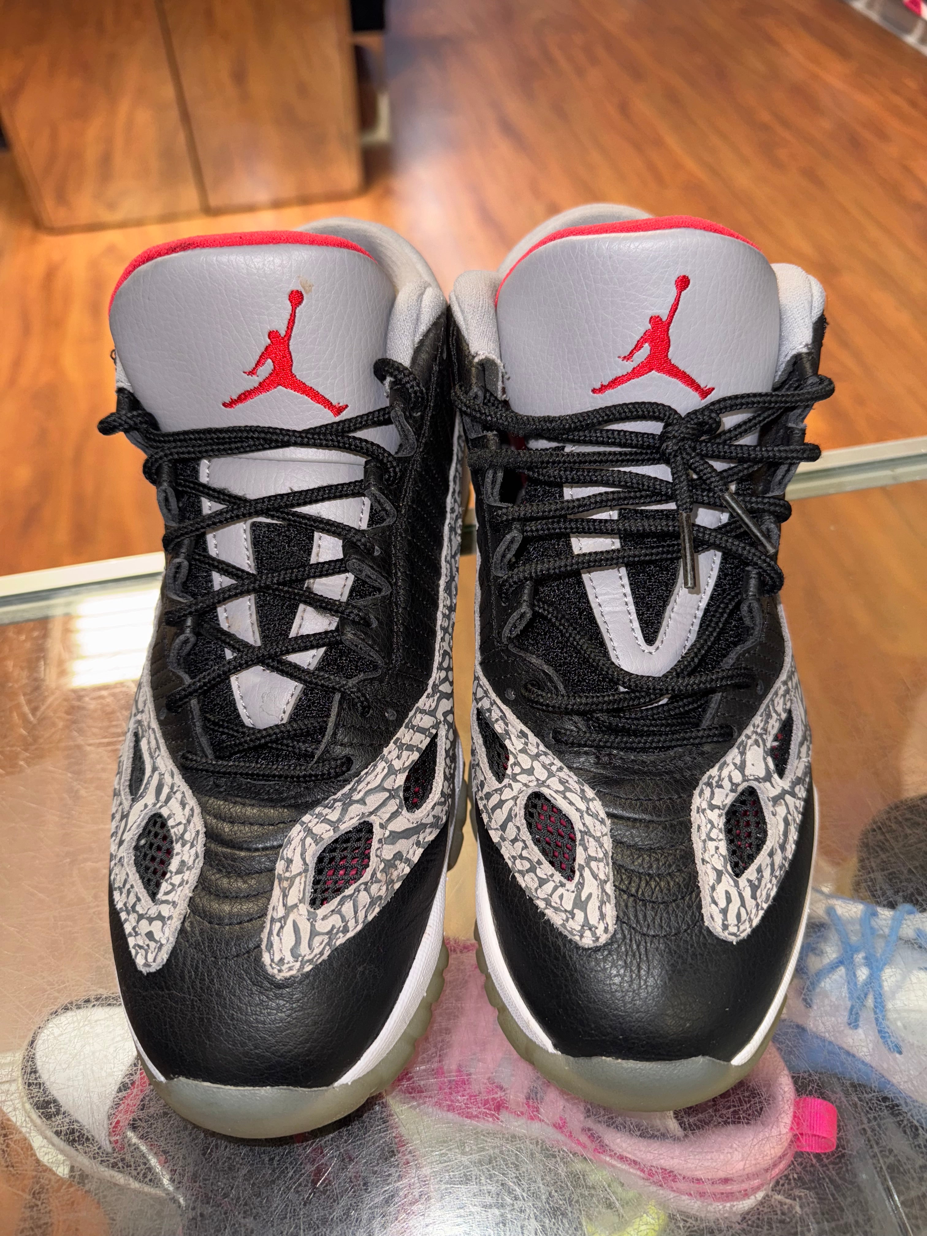 Size 10 Air Jordan 11 Low IE "Black Cement"