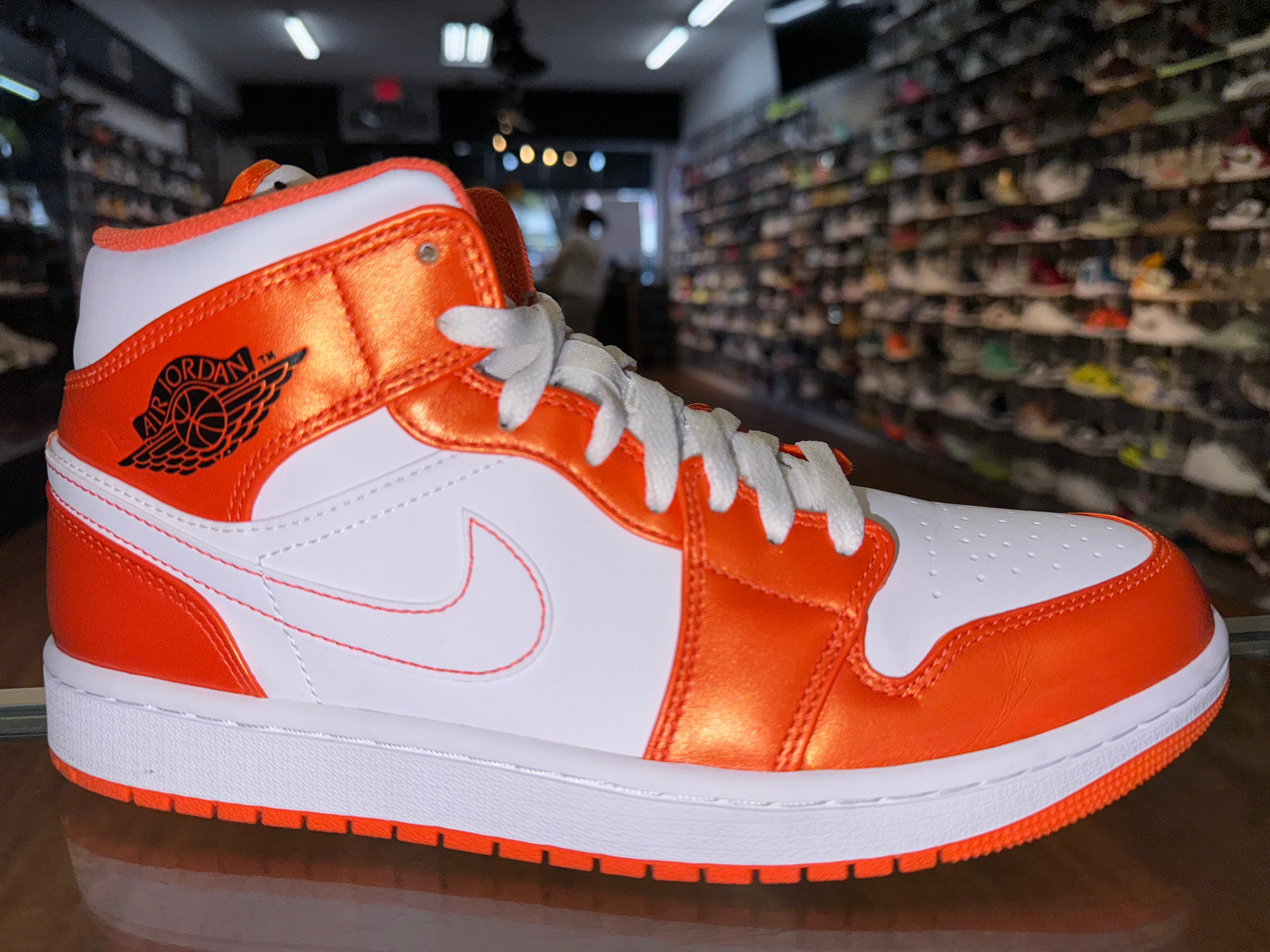 Size 9.5 Air Jordan 1 Mid “Electro Orange”