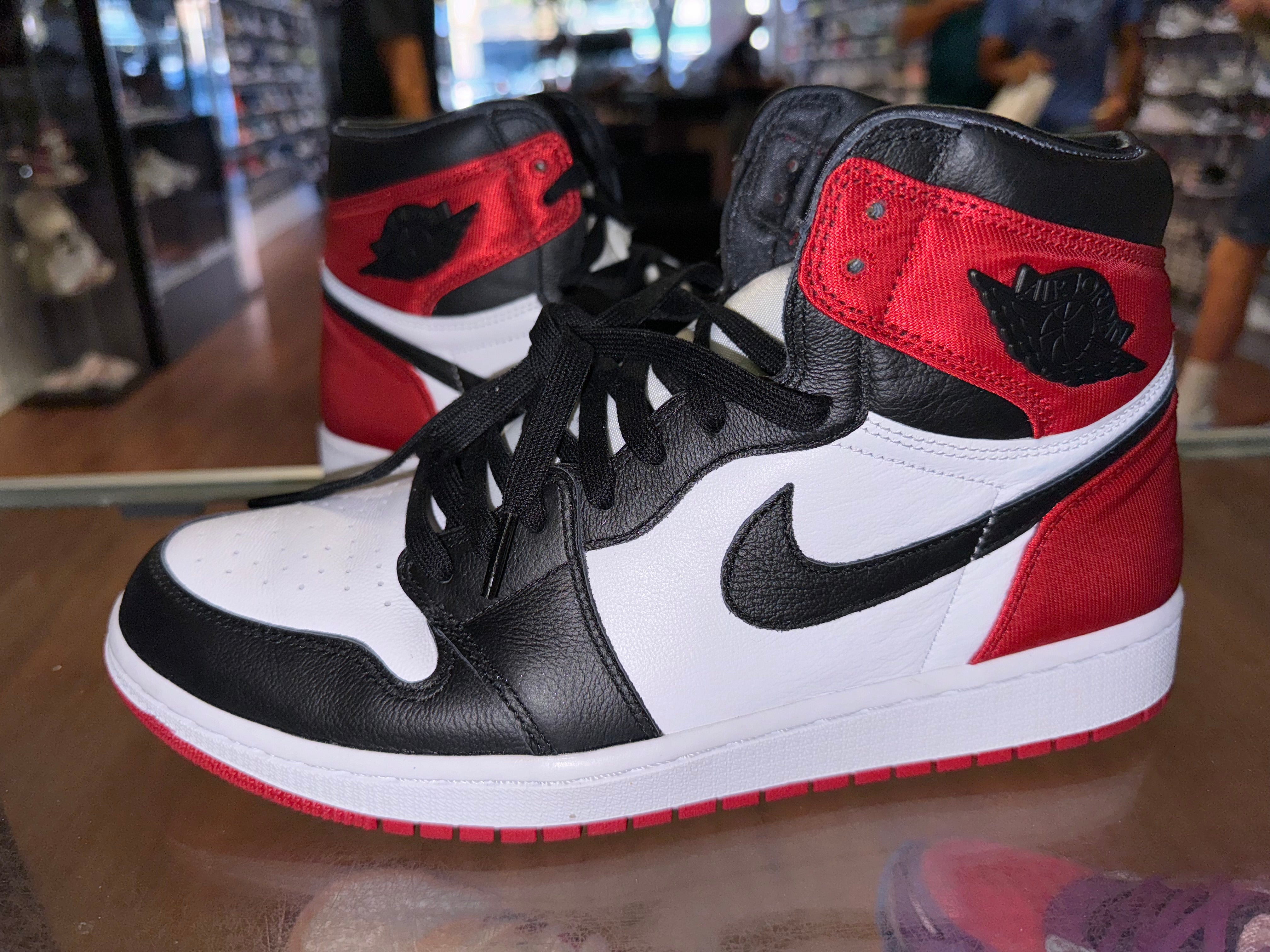 Size 9.5 (11W) Air Jordan 1 “Satin Black Toe”