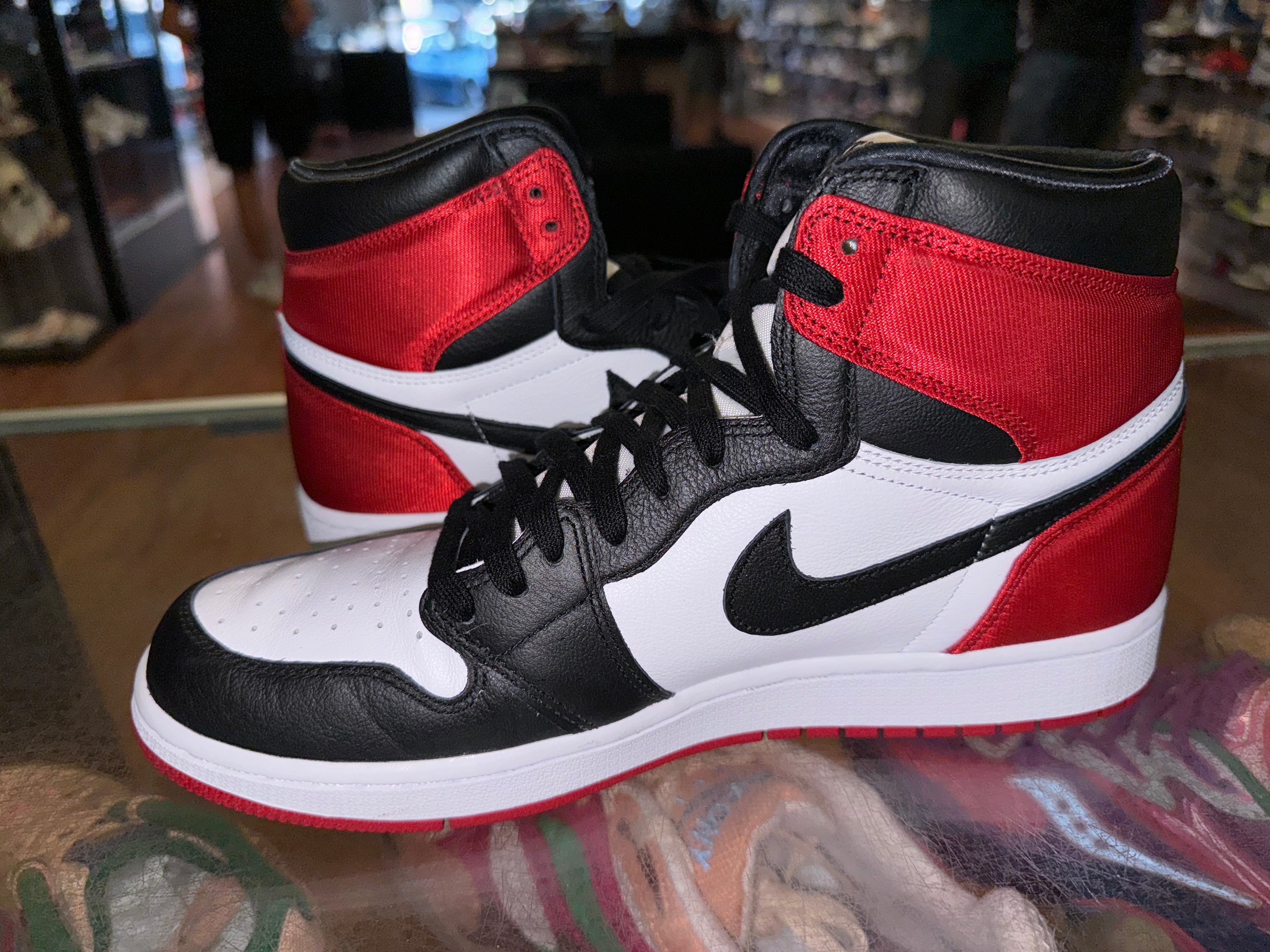 Size 9.5 (11W) Air Jordan 1 “Satin Black Toe”