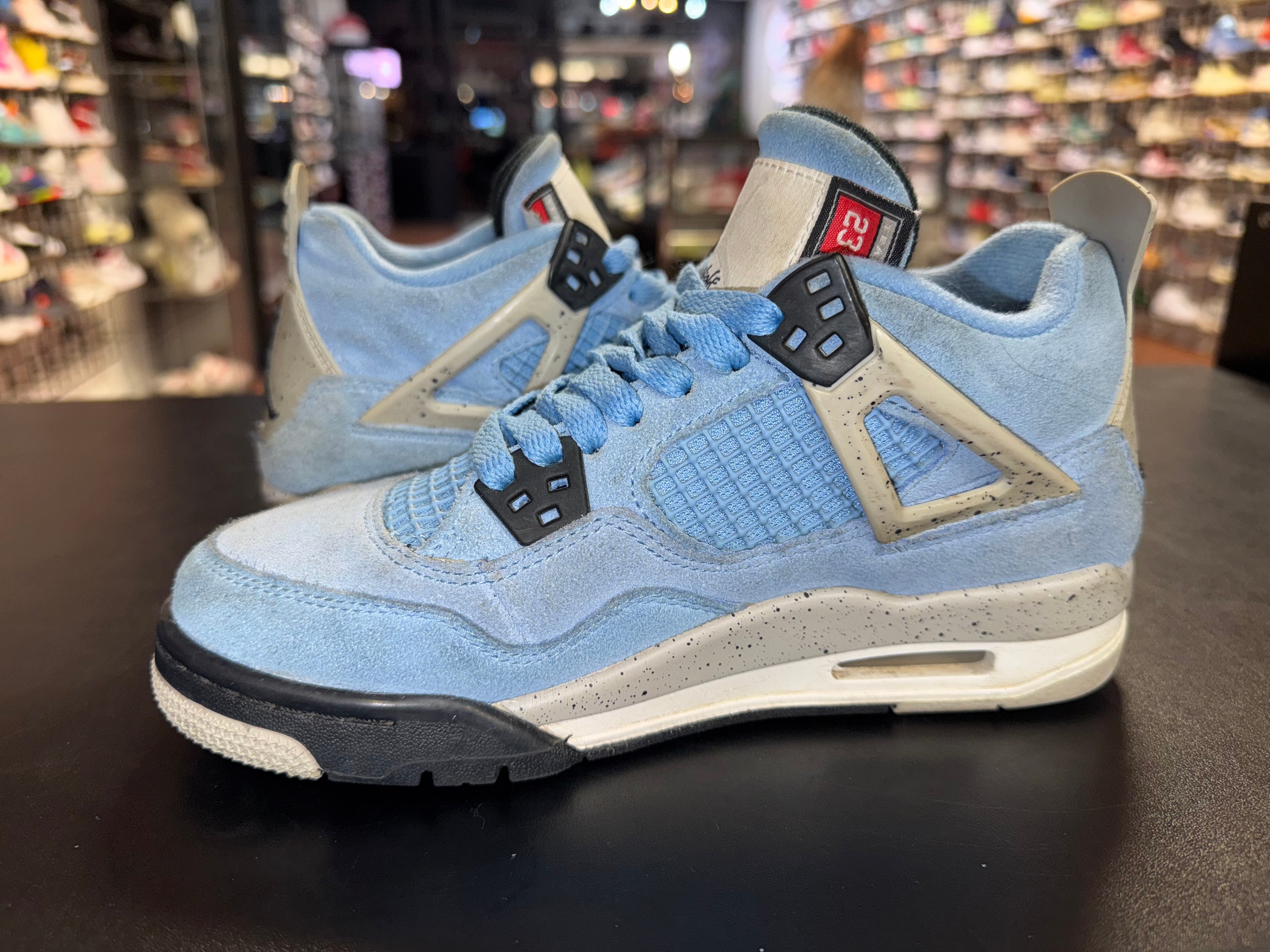 Size 4.5y Air Jordan 4 “University Blue”