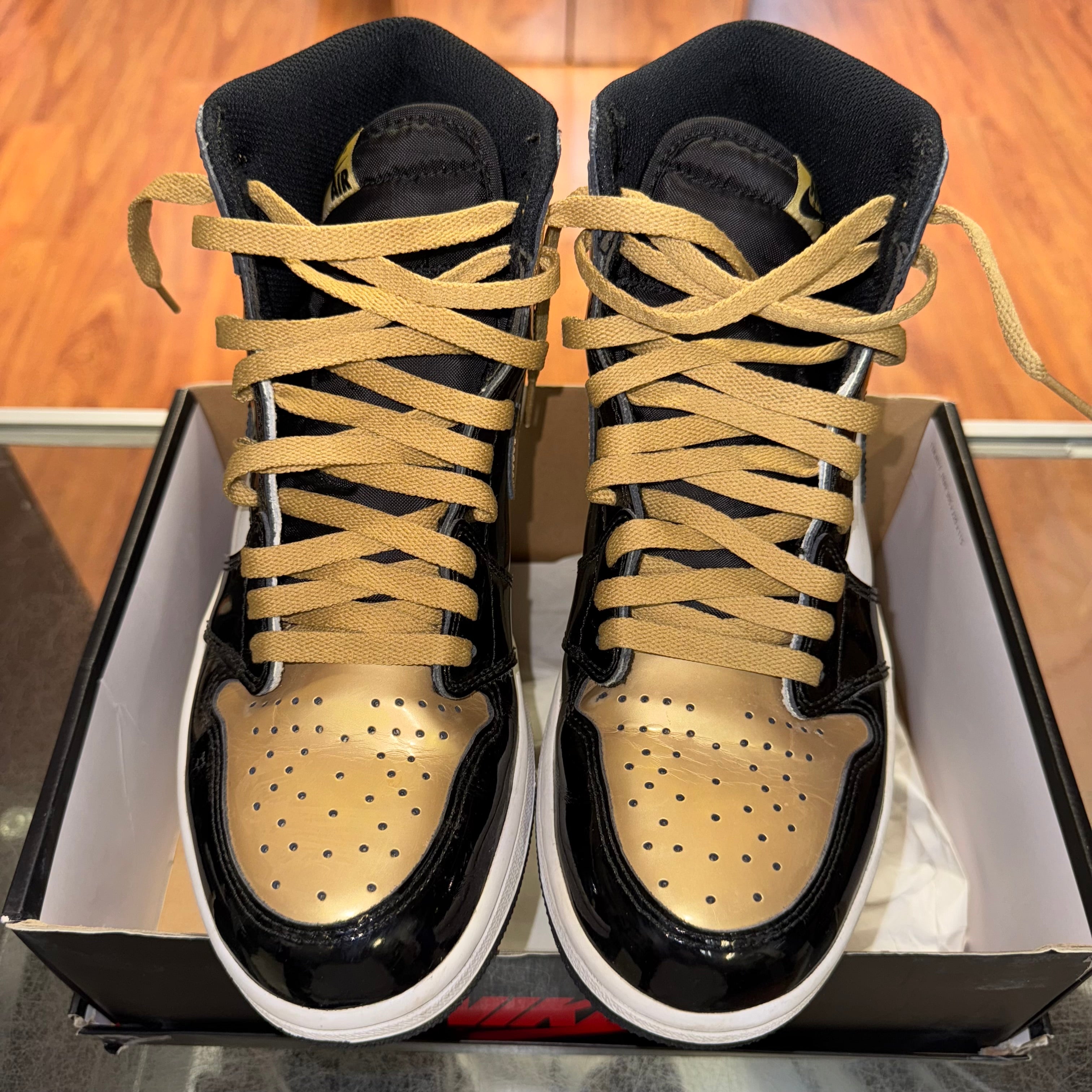 Size 9.5 Air Jordan 1 "Gold Toe"