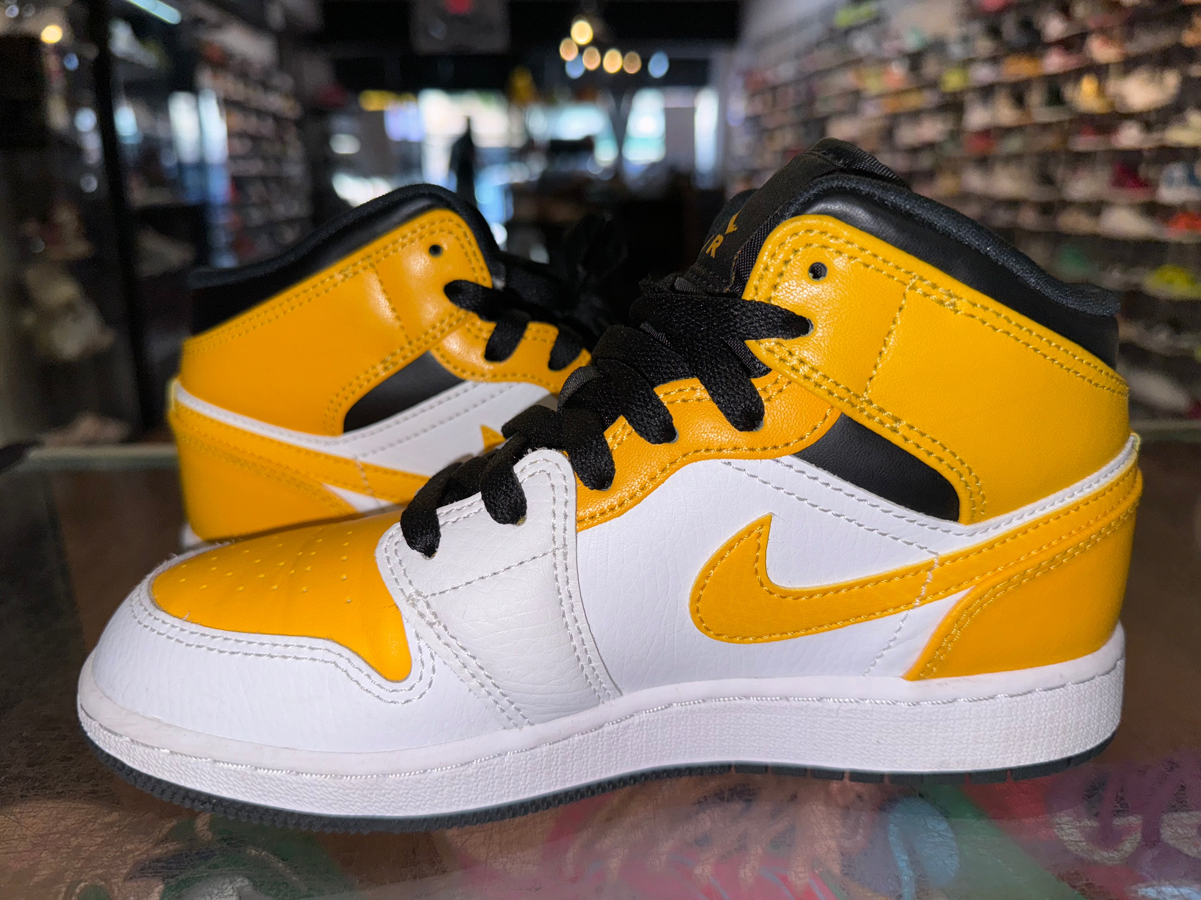 Size 4y Air Jordan 1 Mid “Yellow Toe”