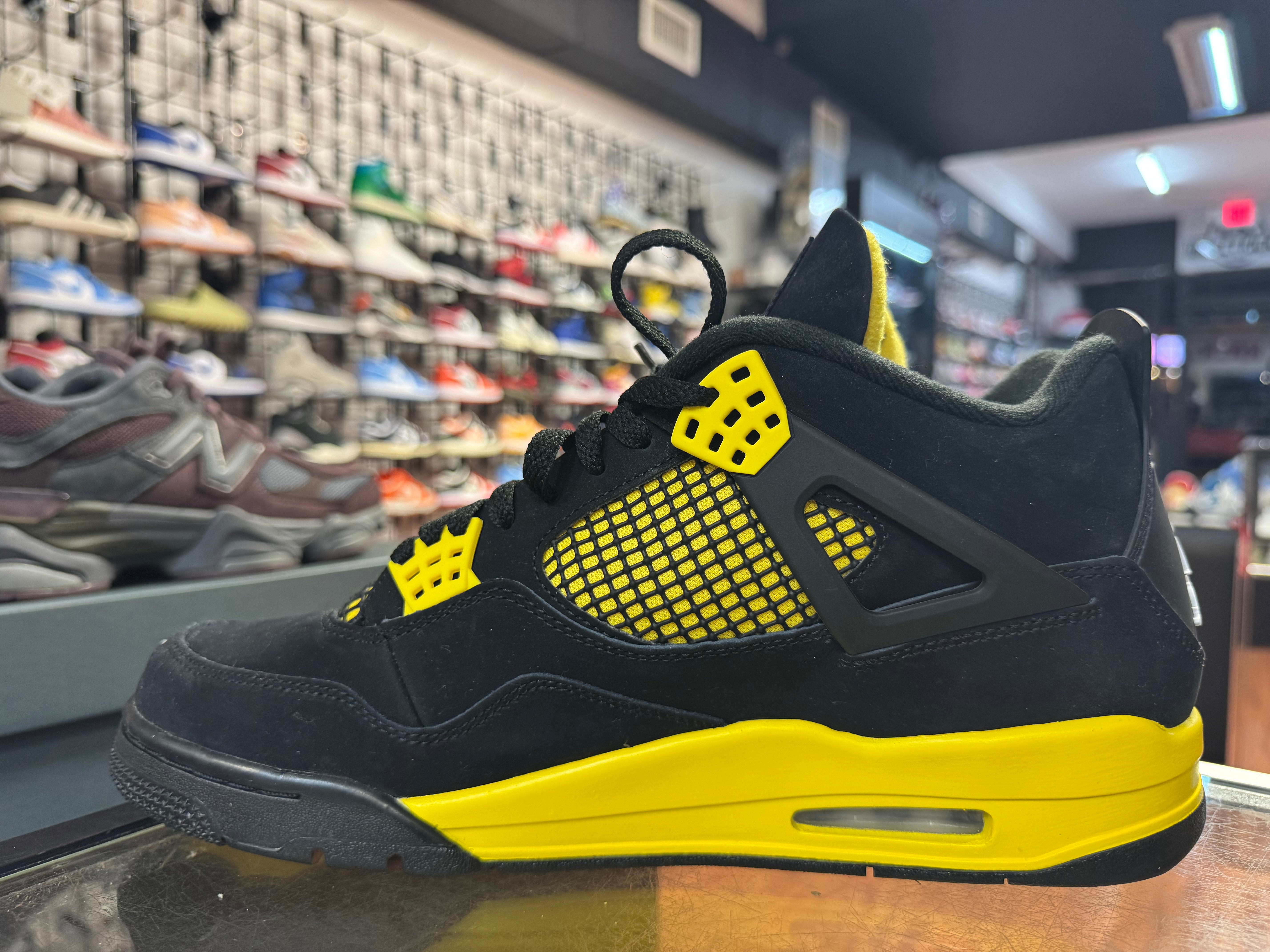 Size 11.5 Air Jordan 4 “Thunder”