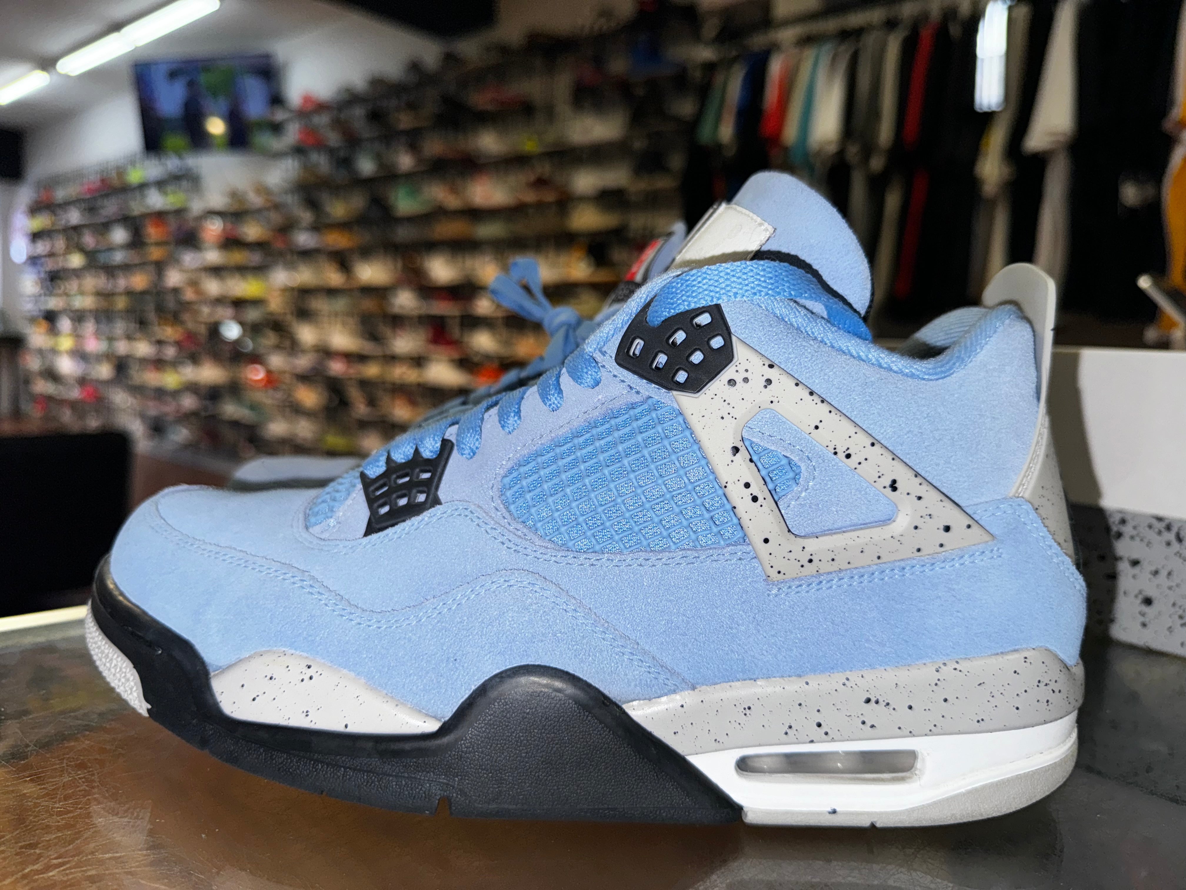 Size 9 Air Jordan 4 "UNC"