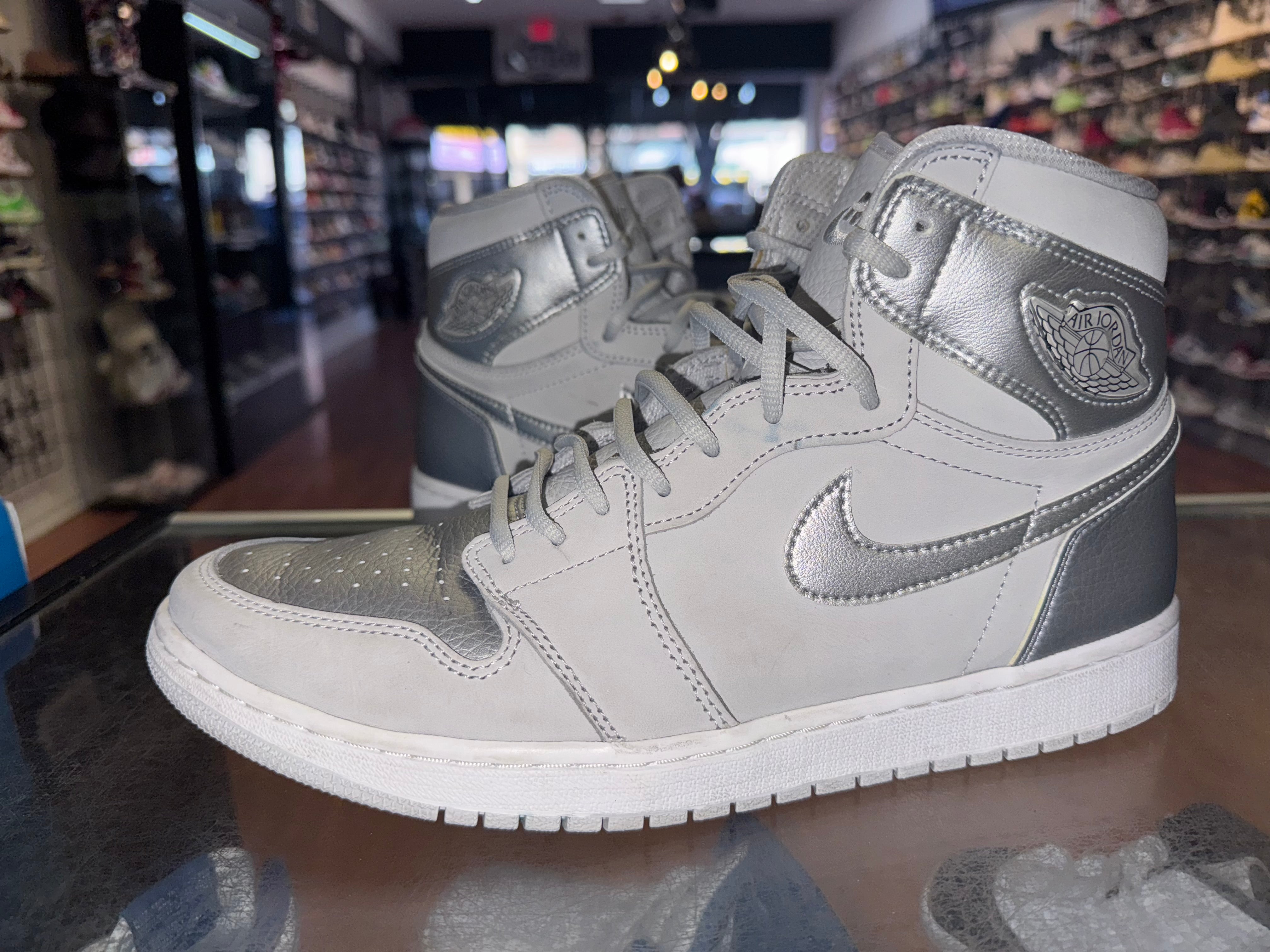 Size 11.5 Air Jordan 1 “COJP Silver”