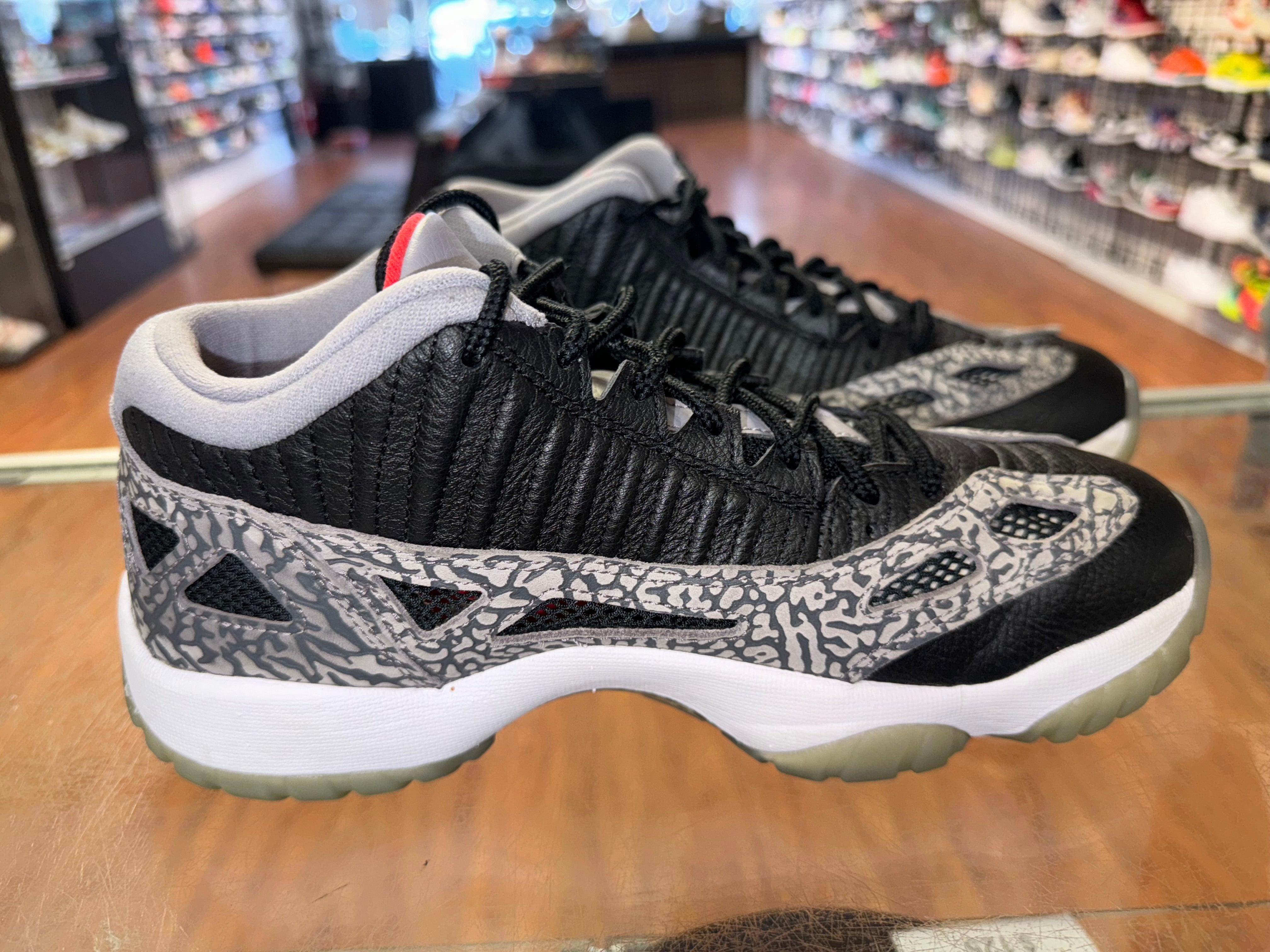 Size 8.5 Air Jordan 11 Low IE “Black Cement”