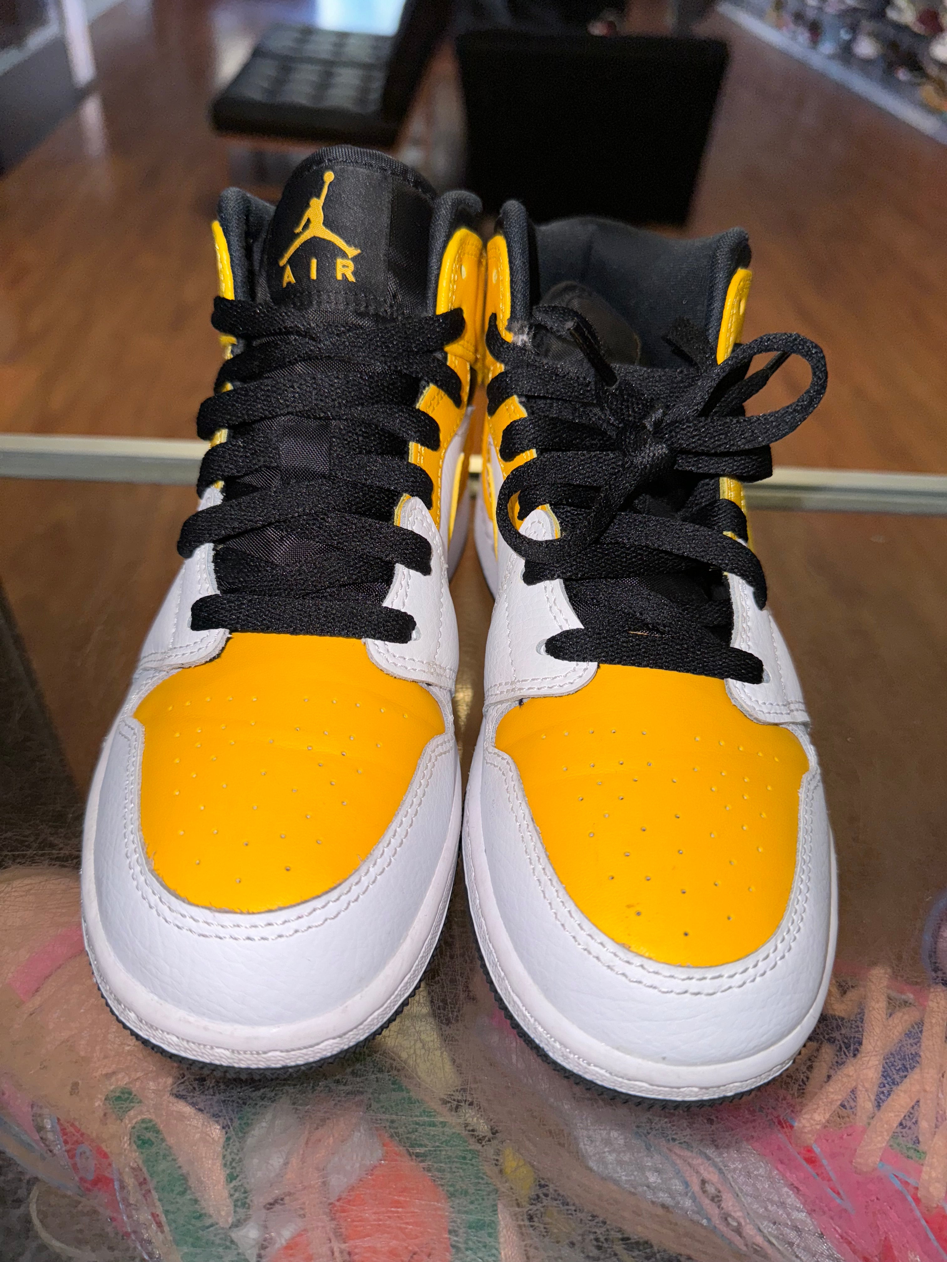 Size 4y Air Jordan 1 Mid “Yellow Toe”