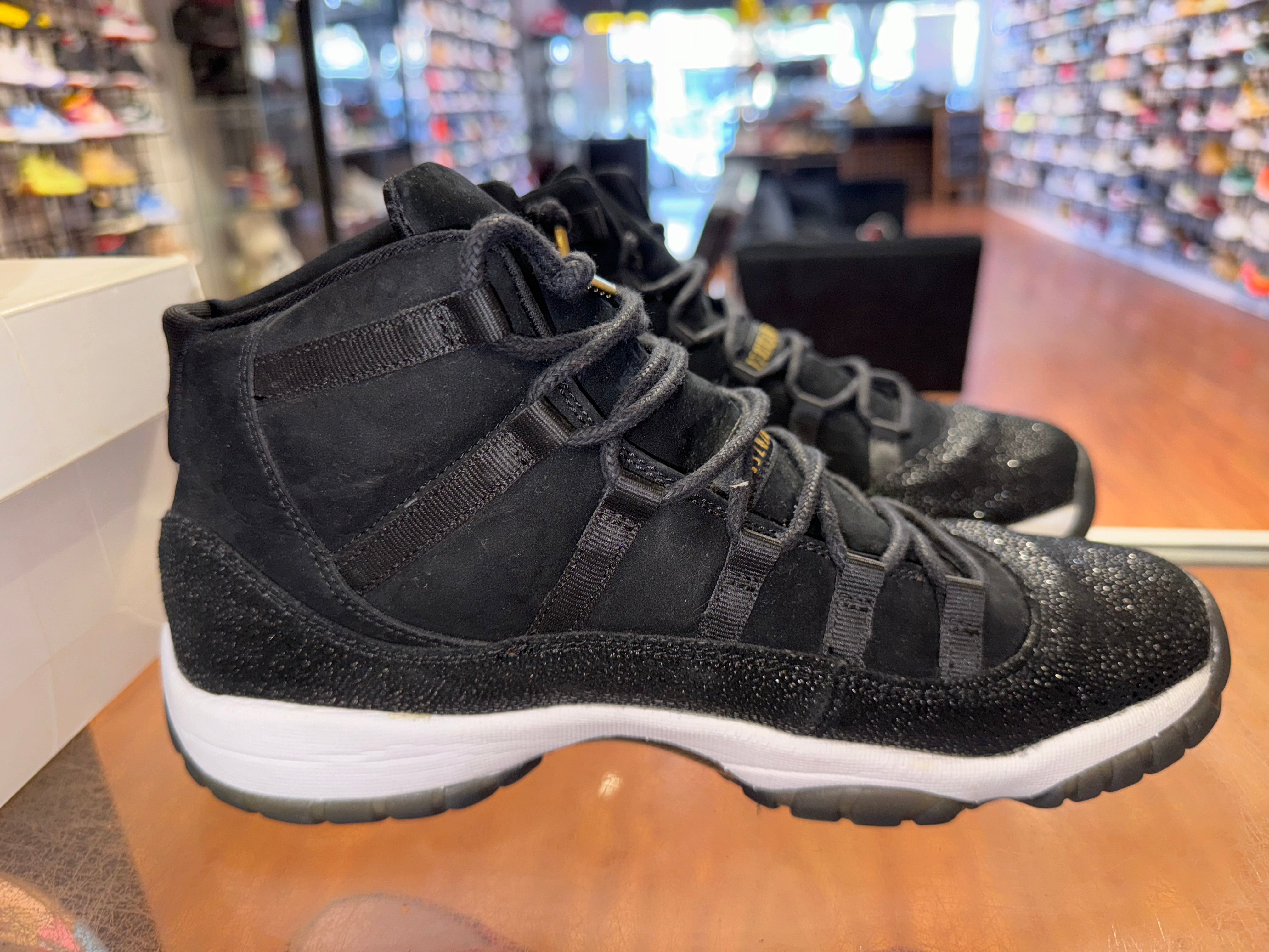 Size 9.5 (11W) Air Jordan 11 Heiress “Black”