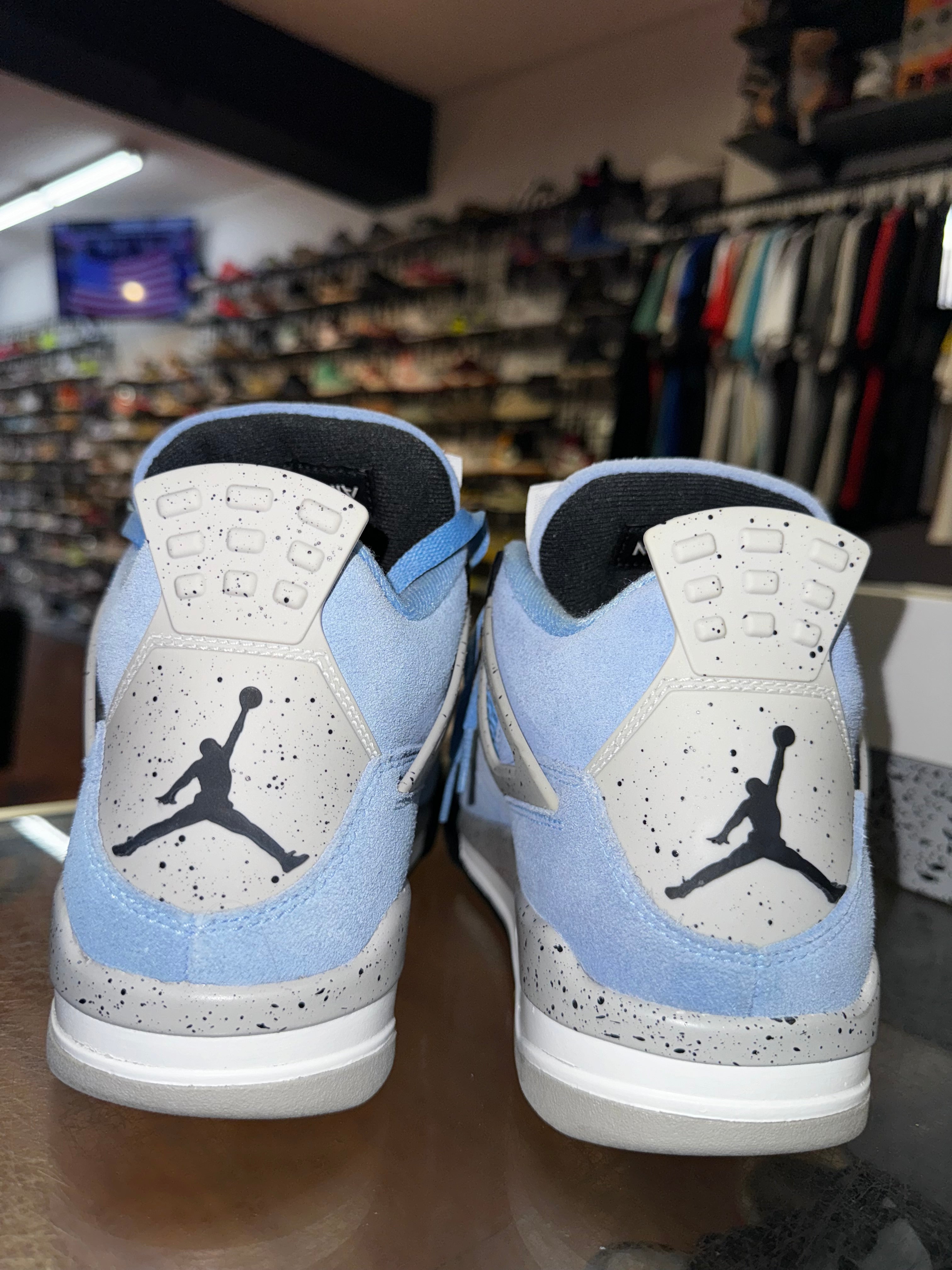 Size 9 Air Jordan 4 "UNC"