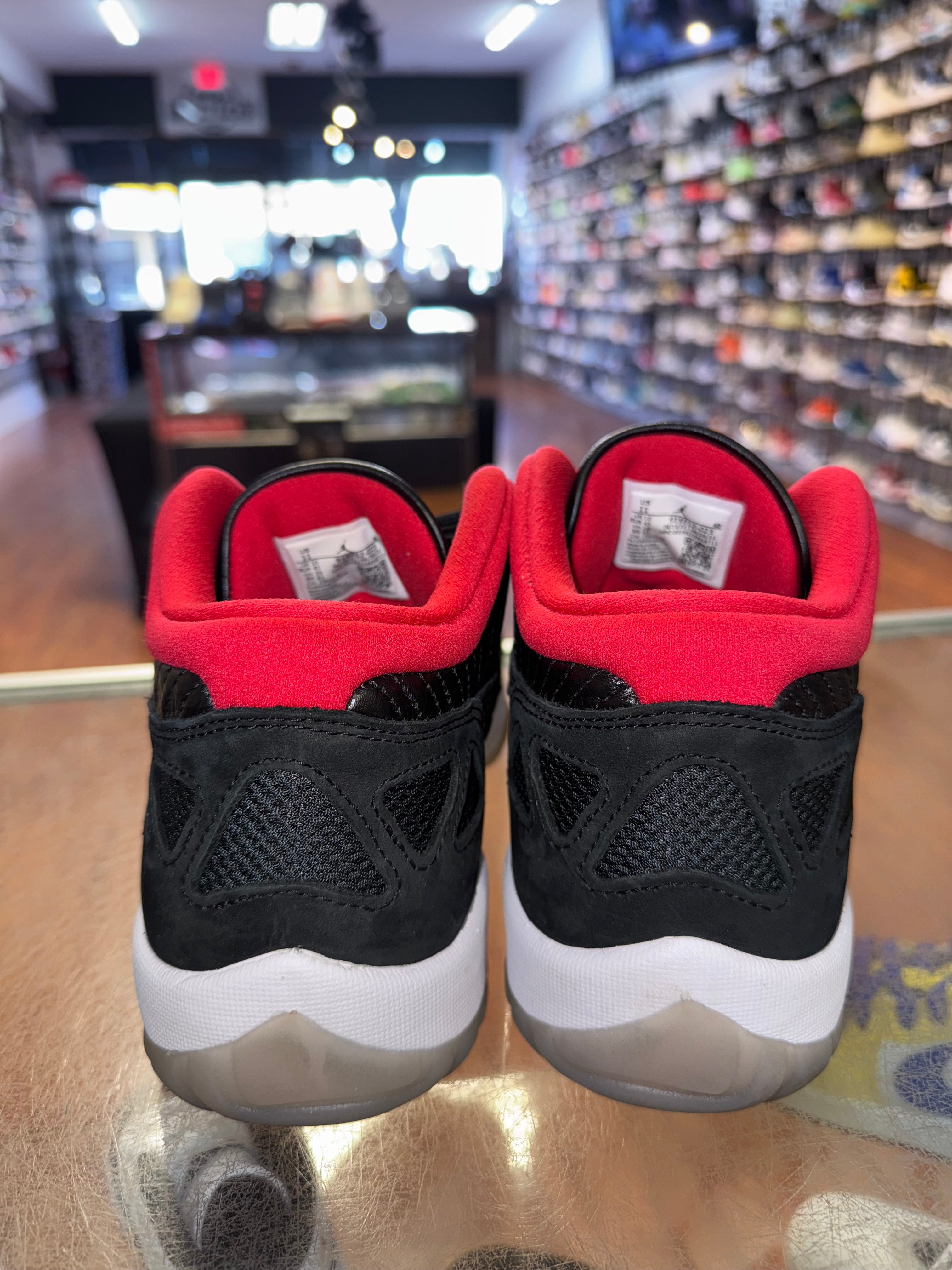 Size 11 Air Jordan 11 Low IE “Black Cement”