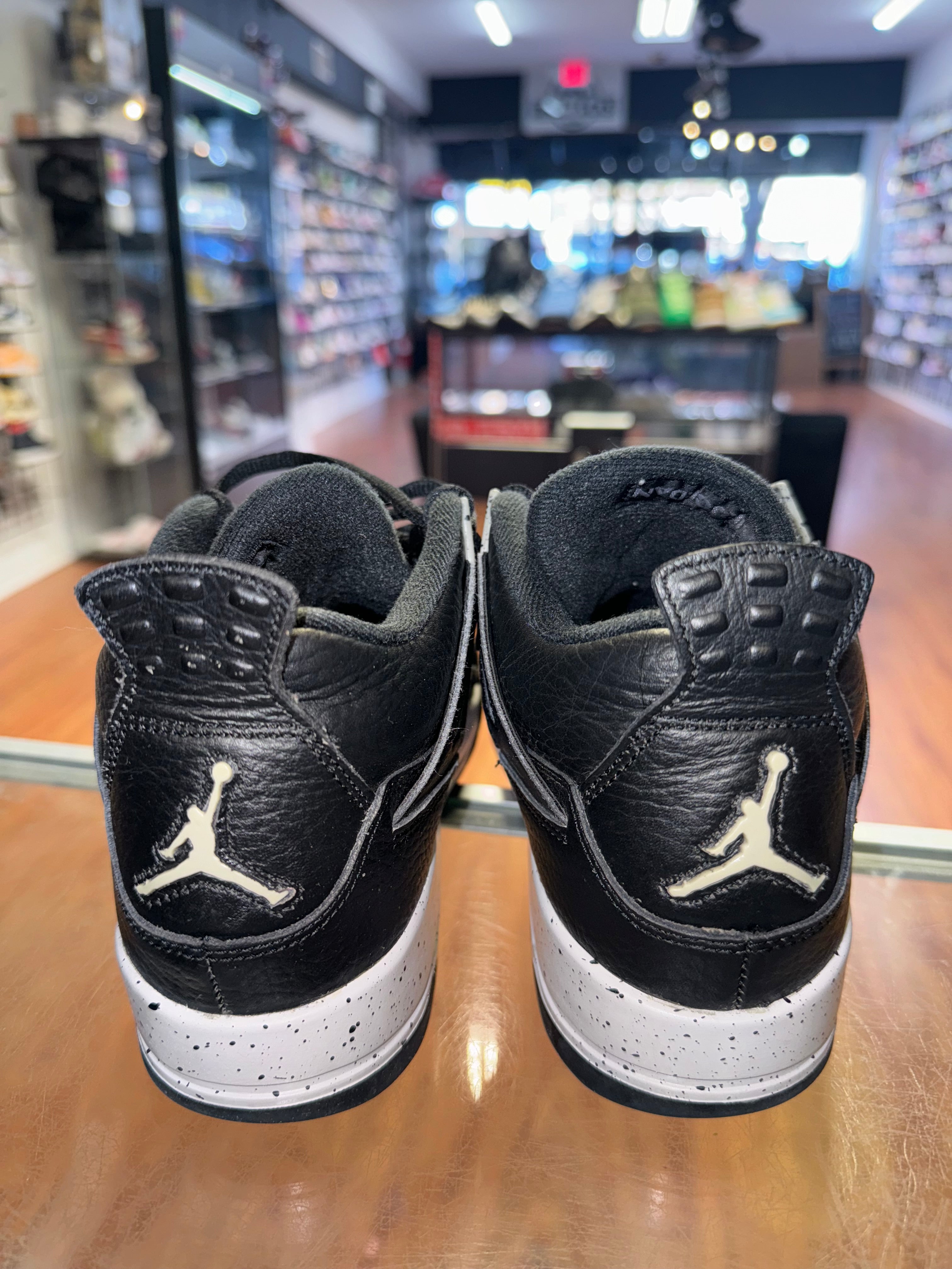 Size 6.5y Air Jordan 4 “Black Oreo”