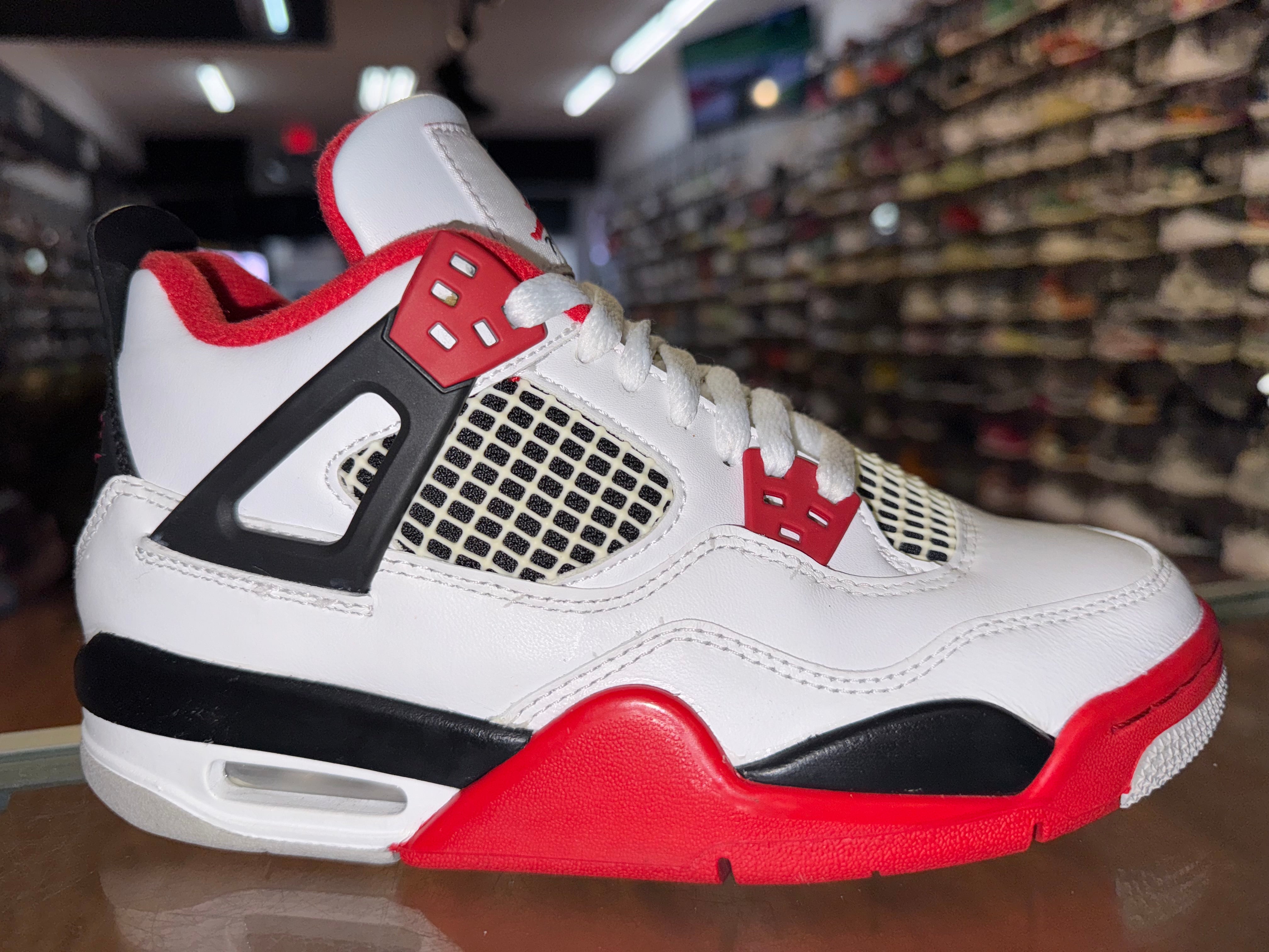 Size 4y Air Jordan 4 “Fire Red”