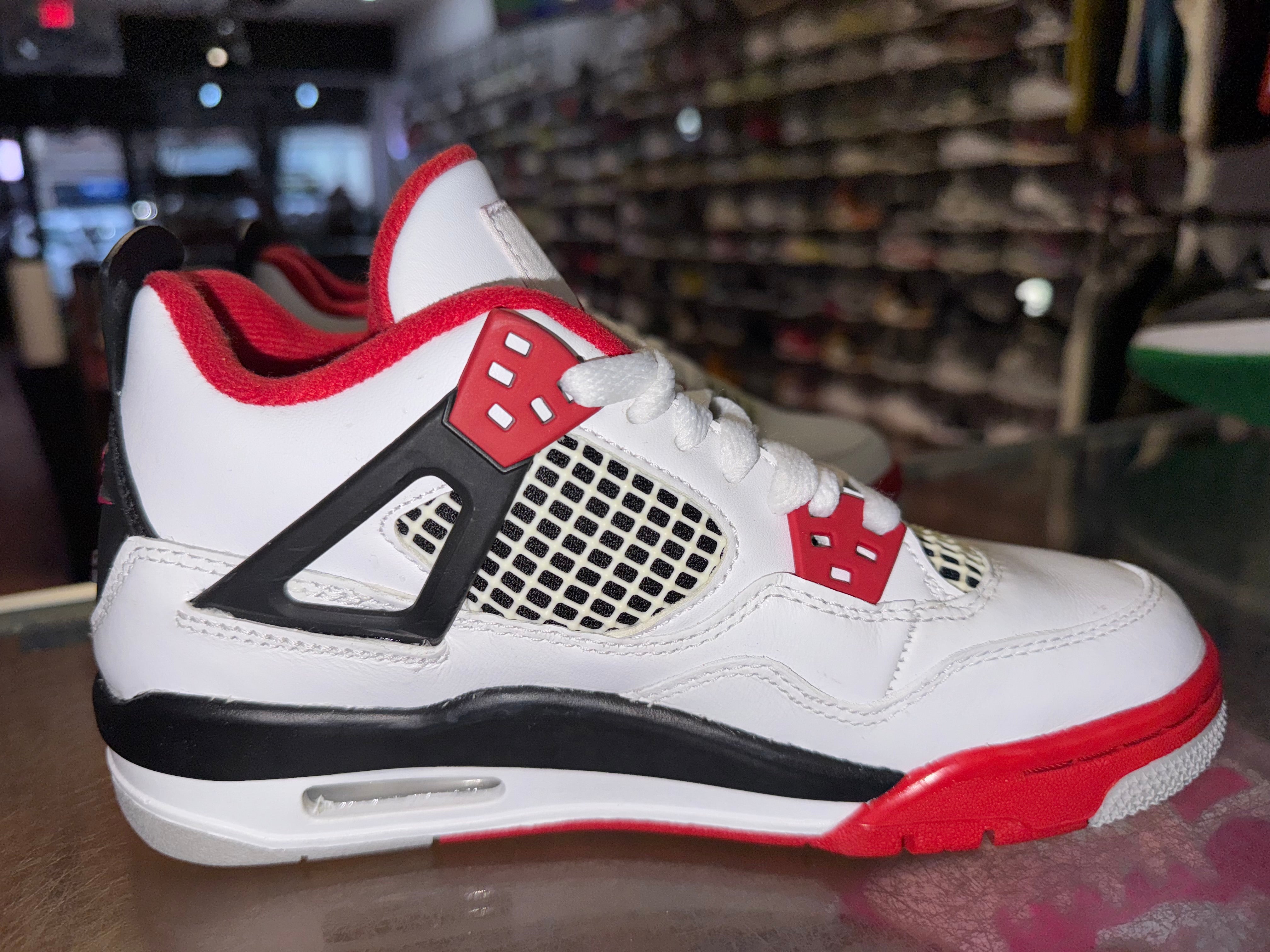 Size 4y Air Jordan 4 “Fire Red”