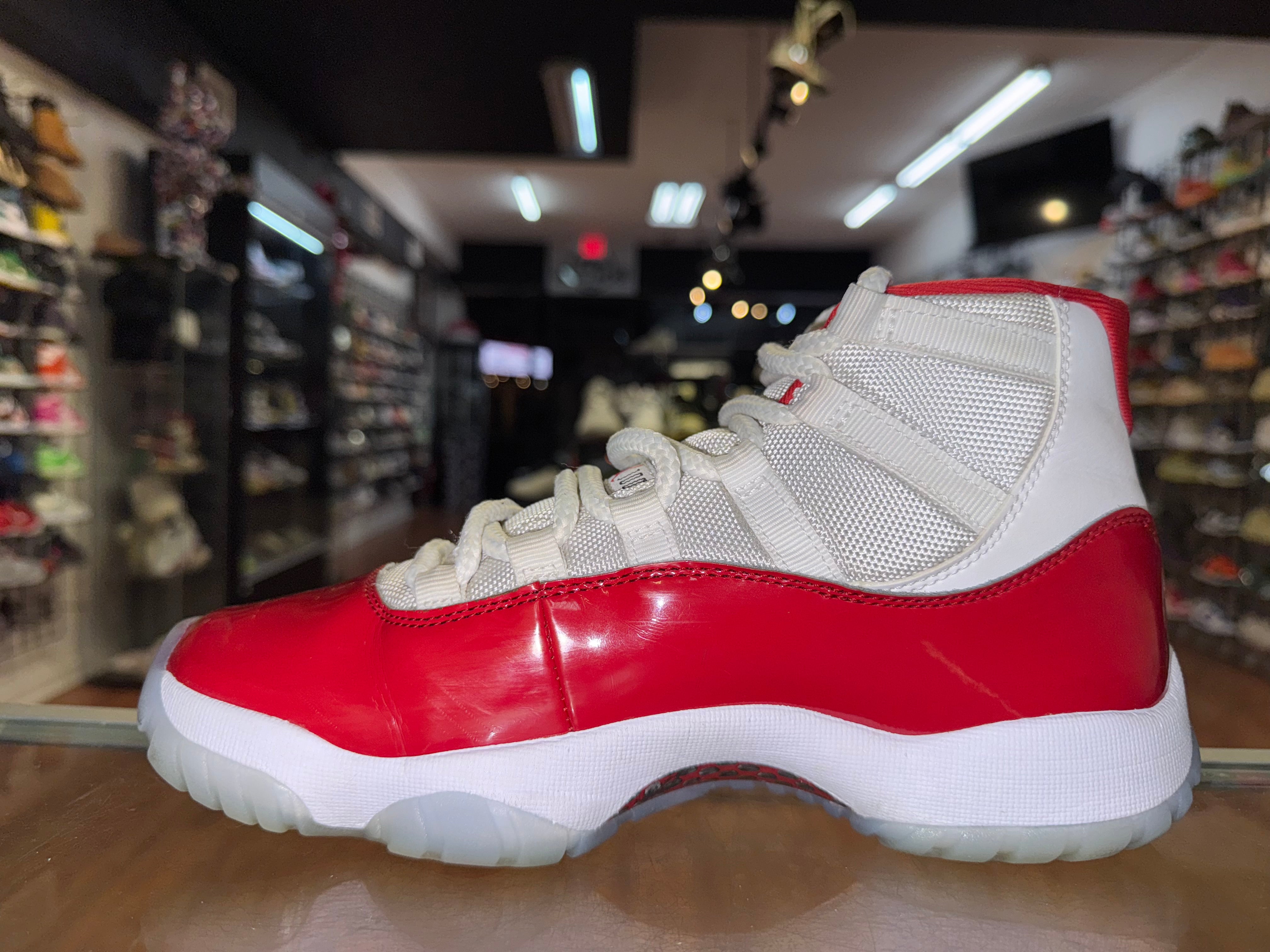 Size 7 Air Jordan 11 "Cherry"