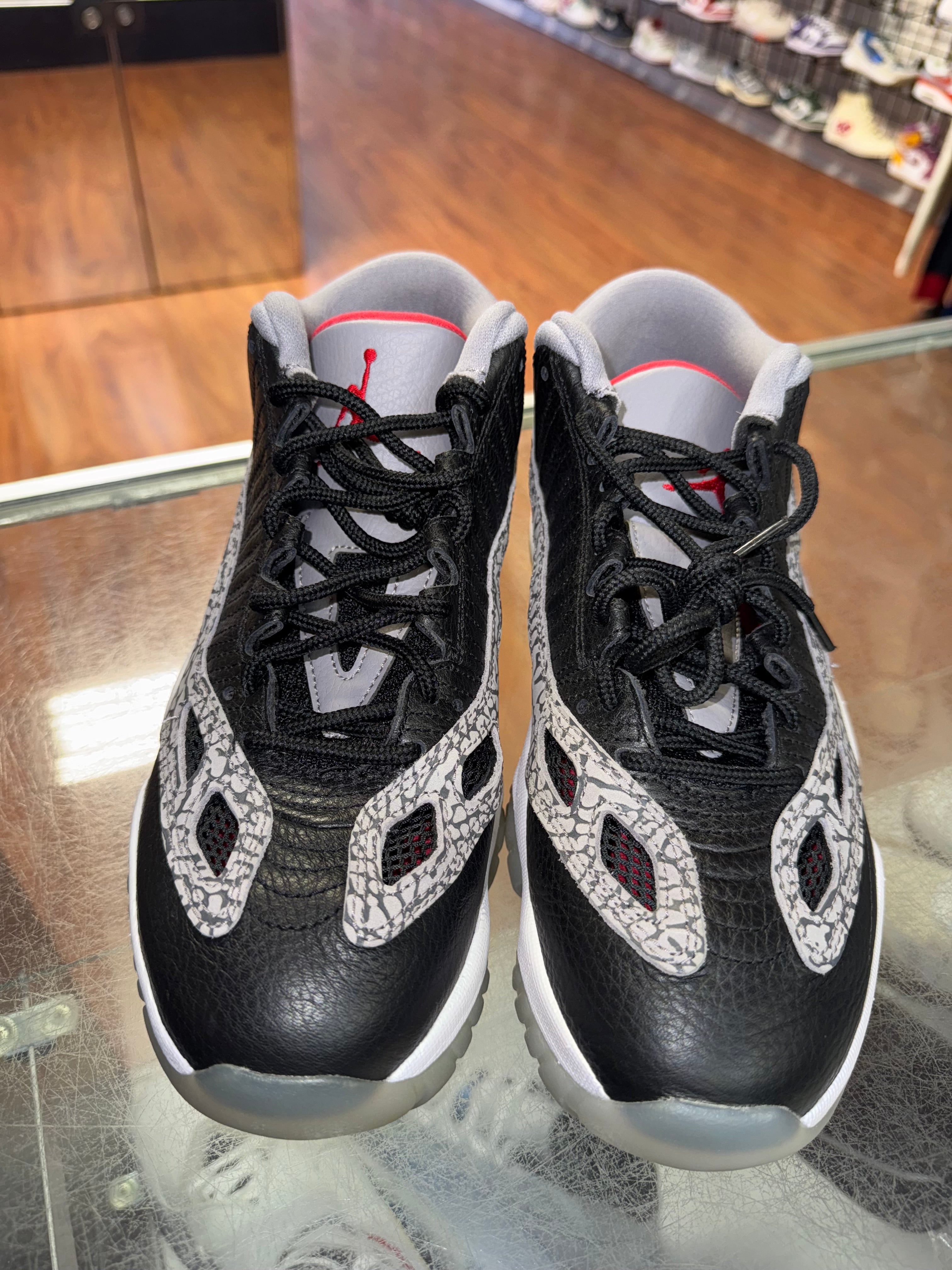 Size 8.5 Air Jordan 11 Low IE "Black Cement"