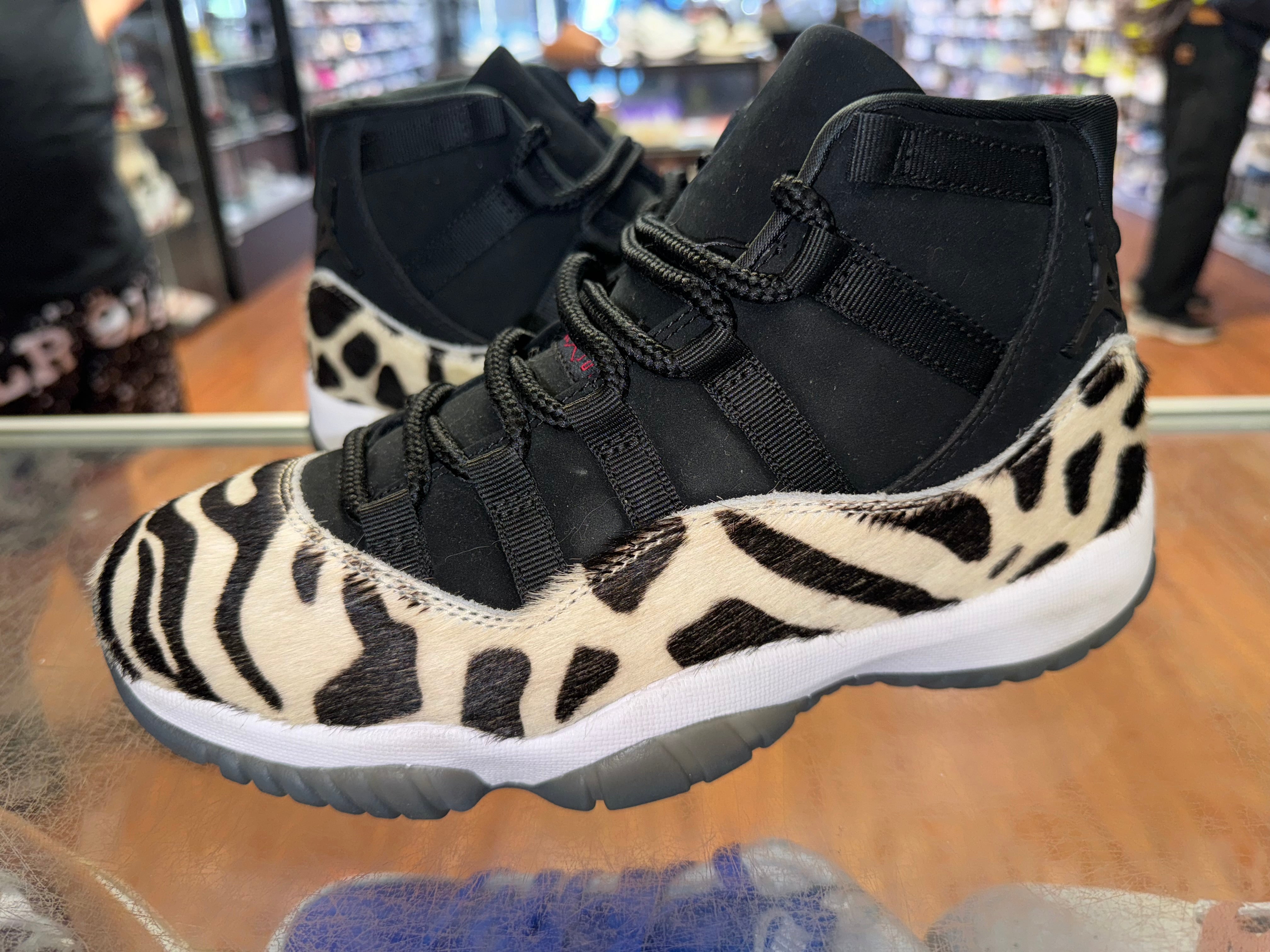 Size 7 (8.5W) Air Jordan 11 “Animal Instinct”