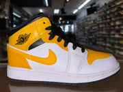 Size 4y Air Jordan 1 Mid “Yellow Toe”