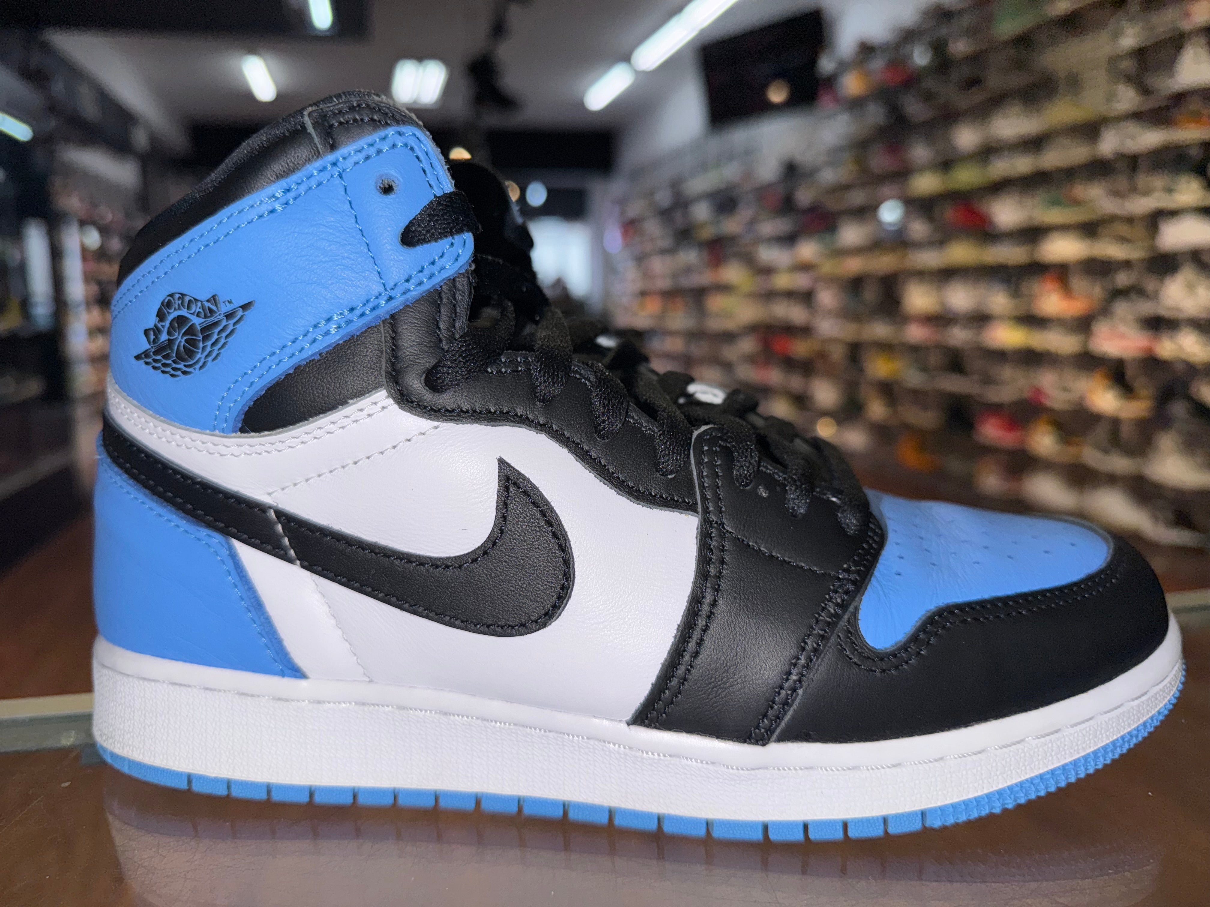 Size 7y Air Jordan 1 “UNC Toe”