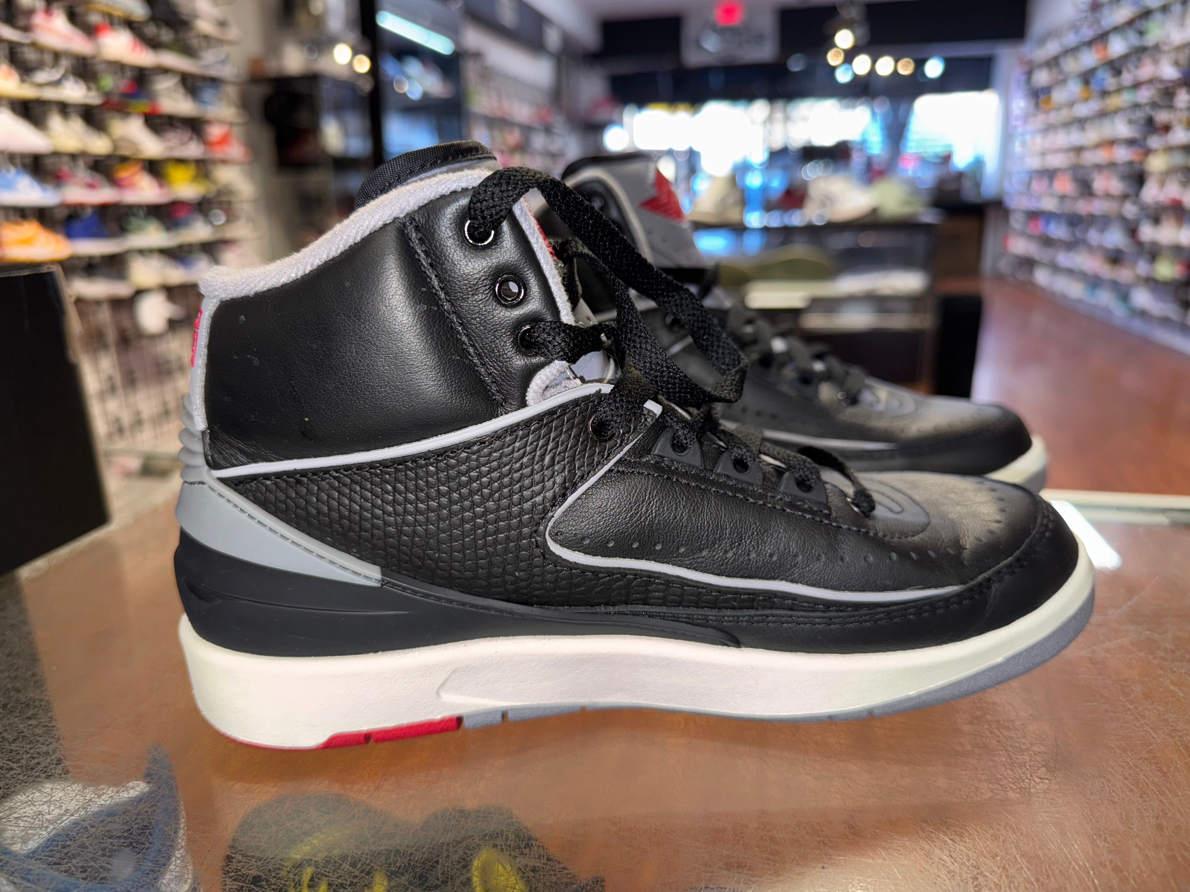 Size 6y Air Jordan 2 "Black Cement"